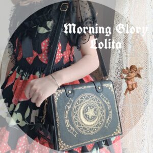Dark grey enchanted grimoire Jirai Kei crossbody bag featuring golden celestial magic pattern and leather handle strap, modeled with vintage angel lace decor dress, three-quarter side view