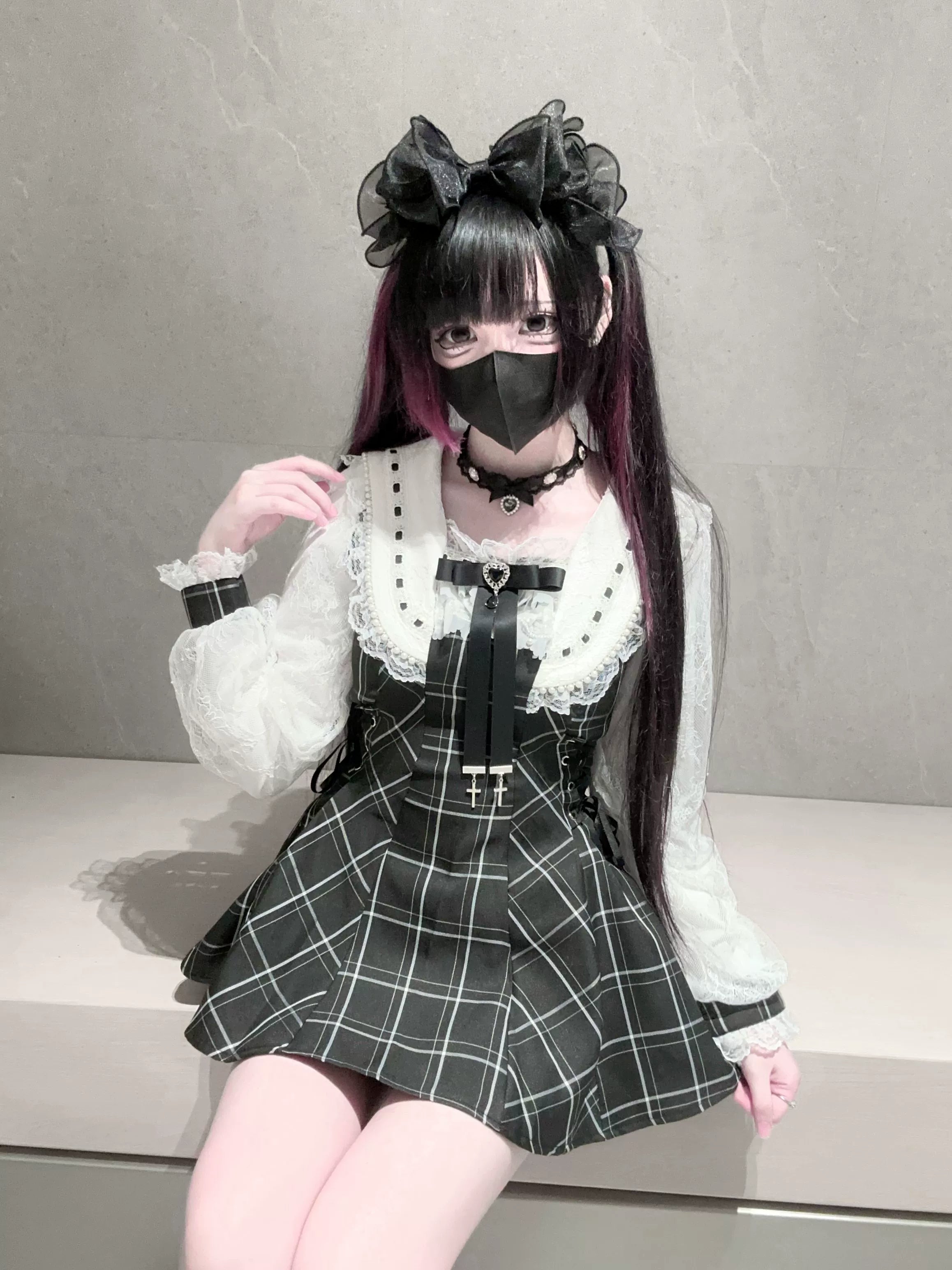 Color comparison view of solid black and plaid variant Jirai Kei outfits displayed side-by-side showing pattern differences
