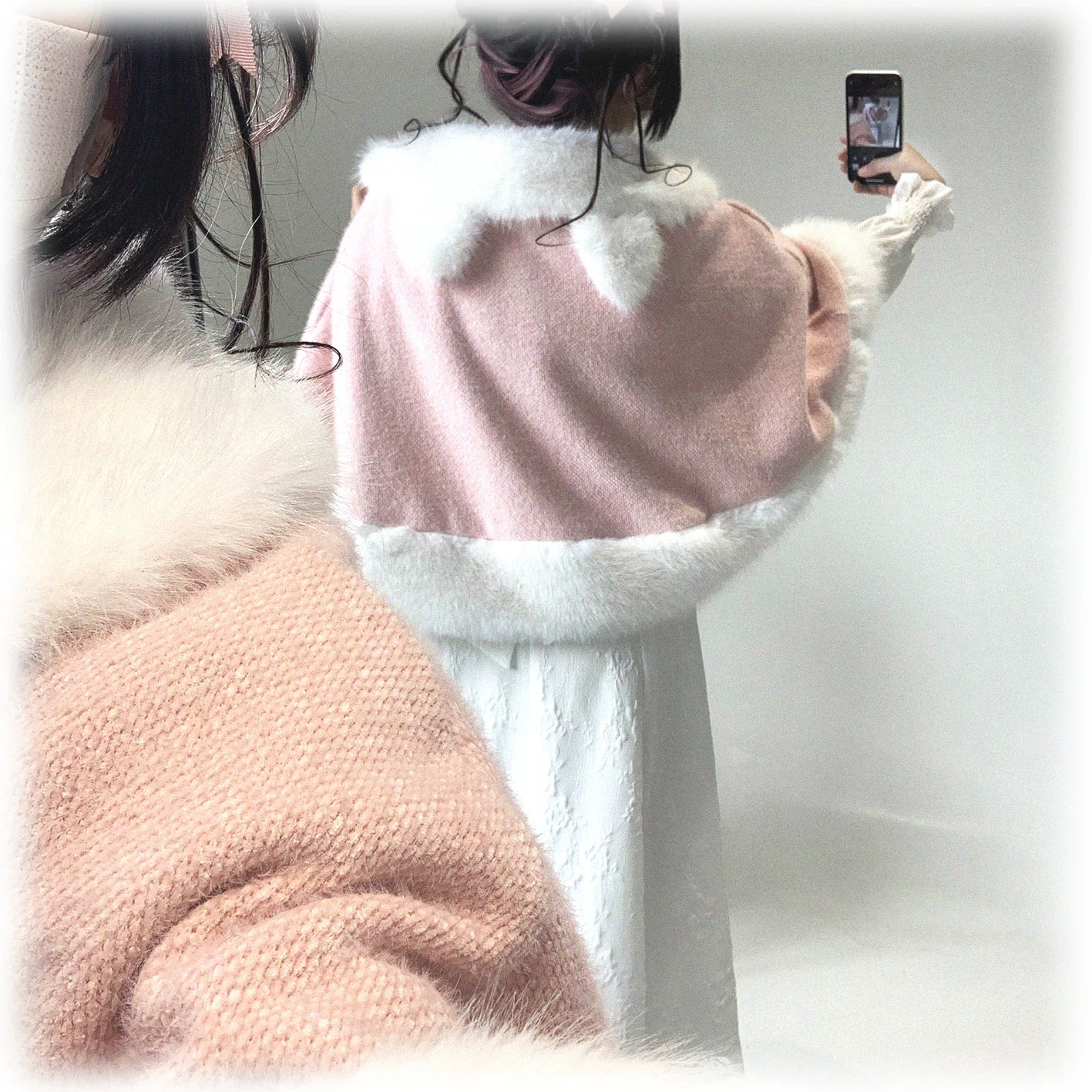 Back view of pink Jirai Kei bunny ear winter cape on model showing full cape silhouette fuzzy hem and collar with bunny ear design