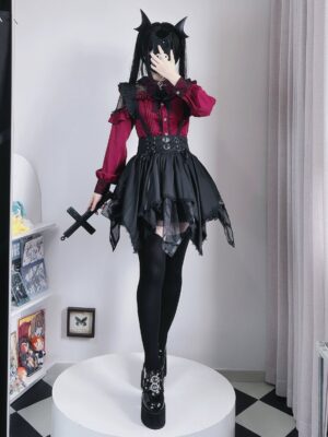 Jirai Kei gothic black multi-layered tulle skirt with heart-shaped buckle corset waistband front standing pose with cross prop
