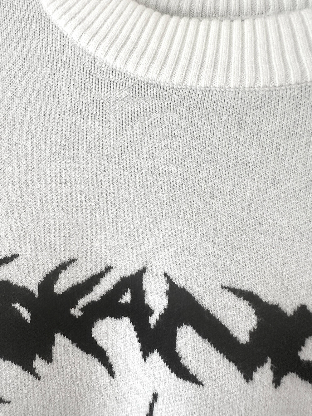 Bat embroidered gothic knit sweater care and material quality polyester durability maintenance information