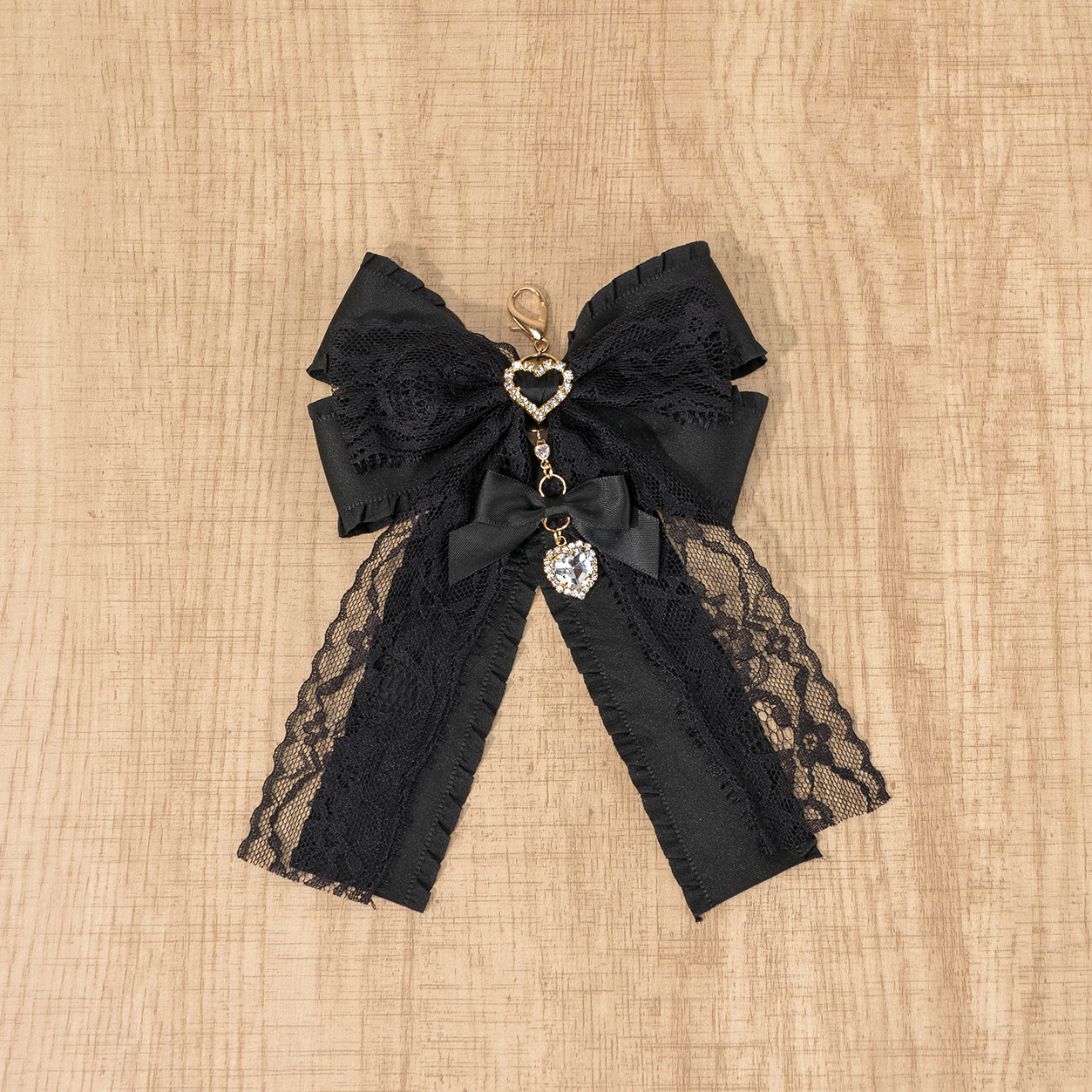 Black Jirai Kei lace bow pendant accessory with full black construction, versatile charm for necklace or keychain attachment