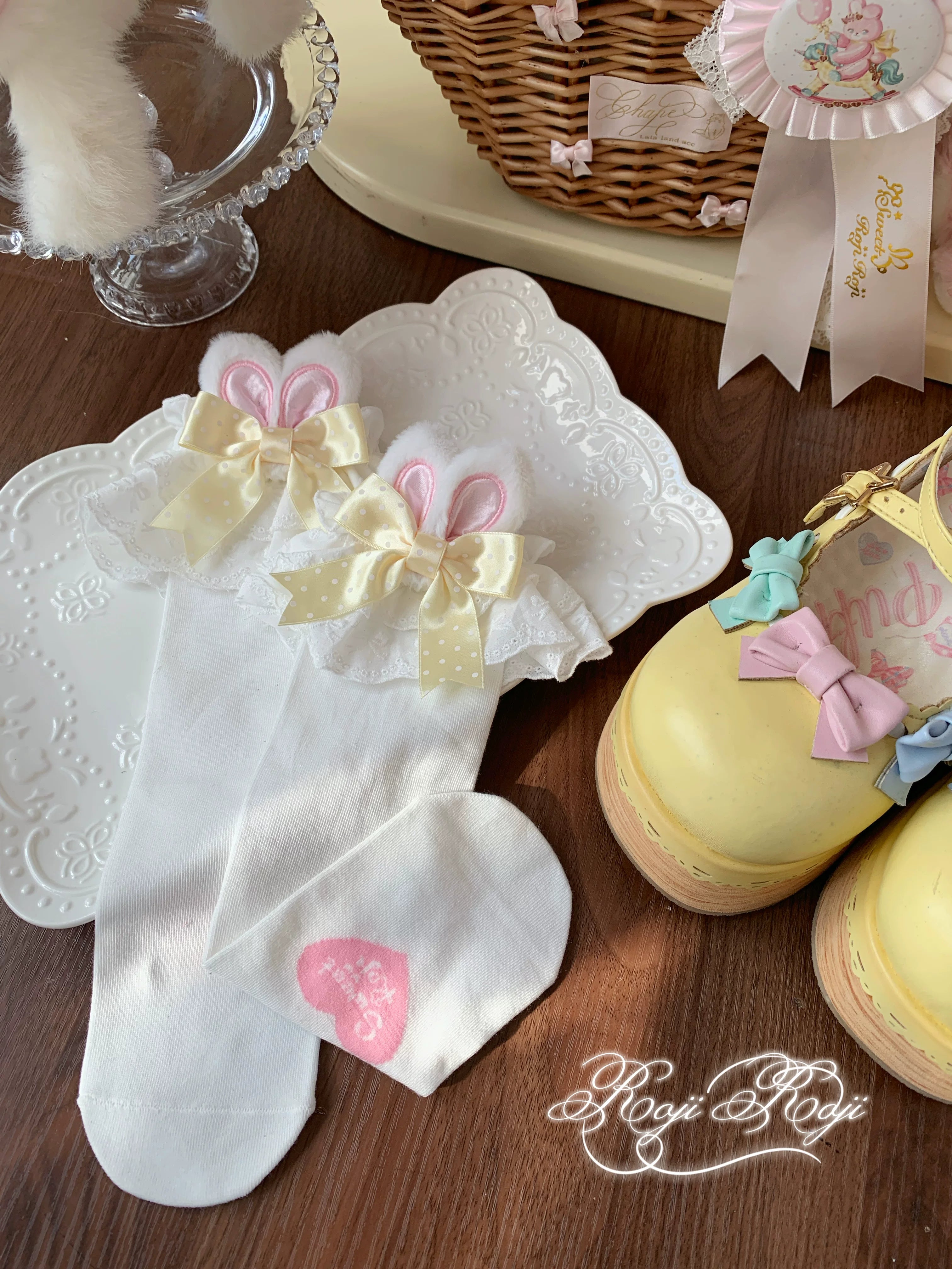 Jirai Kei light yellow polka dot bunny ear socks with white base and delicate lace trim for sweet Lolita fashion coordinates