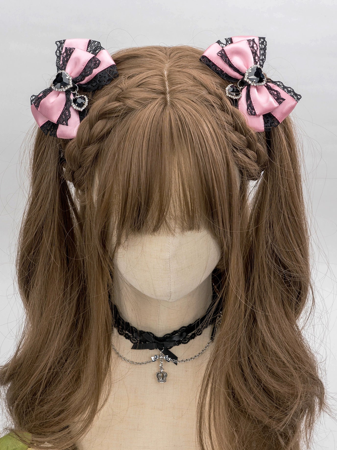 jirai kei bow hair clip metal alligator clip base showing secure fastening mechanism side angle