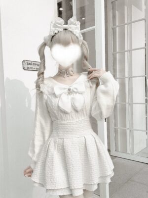 Off-white cream sailor collar Jirai Kei sweater with textured knit fabric and large white detachable bow, front full-body styling with layered ruffle skirt and cute aesthetic details