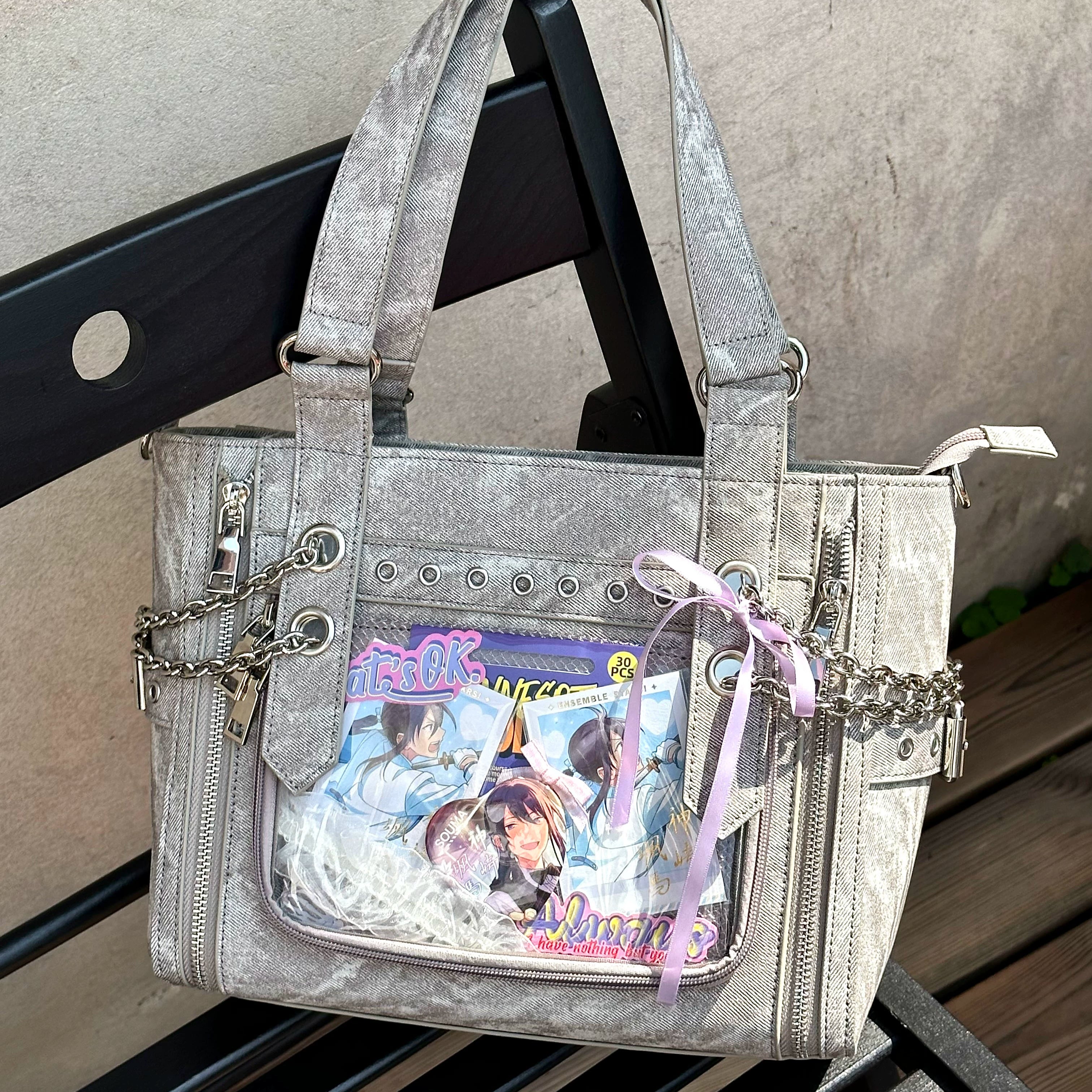 Washed grey denim Jirai Kei ita bag with purple ribbon bow decoration metal chains and anime display window