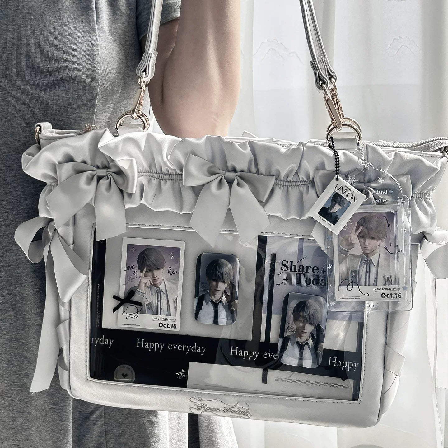 Jirai Kei itabag hand carry position showing dual top handles grip comfort and bag silhouette when held by hand