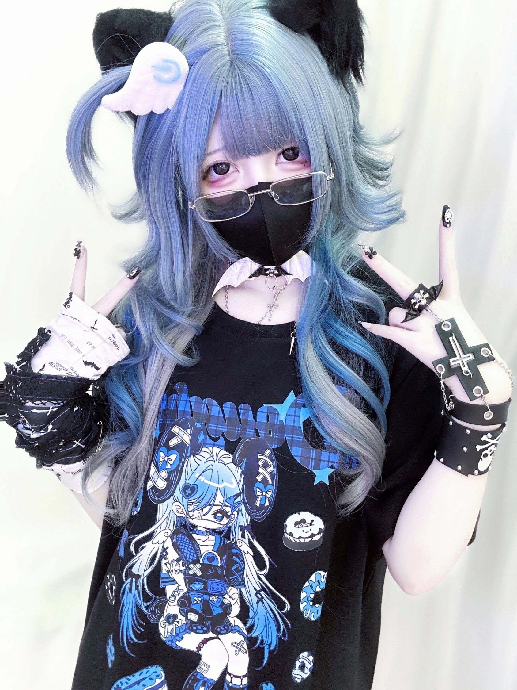 Jirai Kei oversized anime punk T-shirt detailed product showcase highlighting masked anime girl print with band-aid motifs, donut decorations, and vibrant color variations