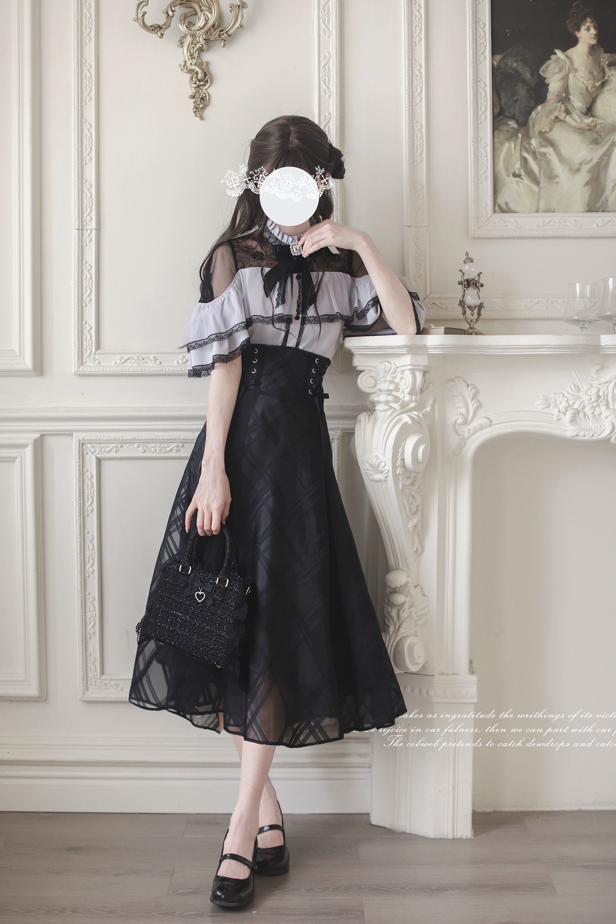 Jirai Kei two-piece outfit side angle, black handbag and bow necktie details visible in fireplace vintage room, cape blouse with adjustable back neckline