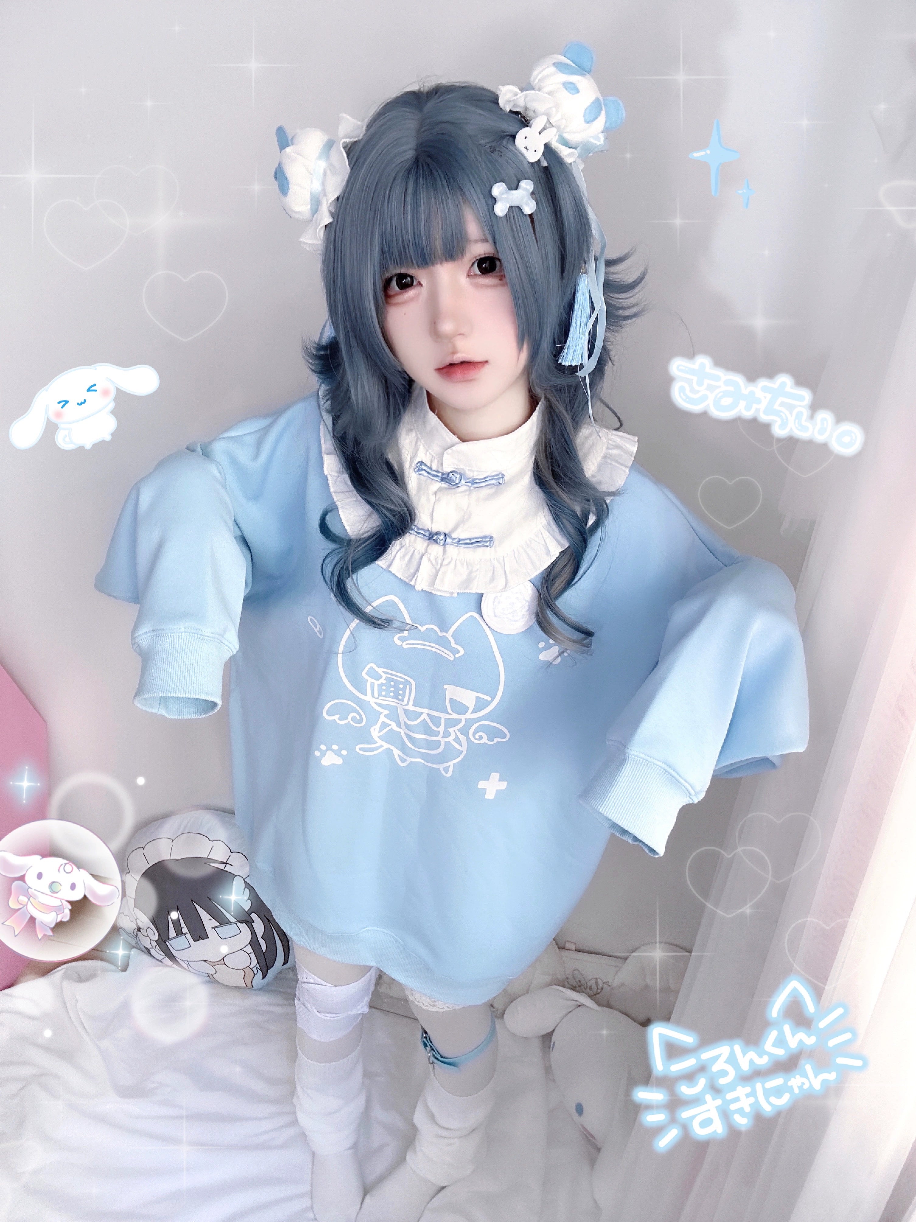 Full-body front view of oversized light blue cat print Jirai Kei sweatshirt with detachable collar, worn with thigh-high stockings and blue accents