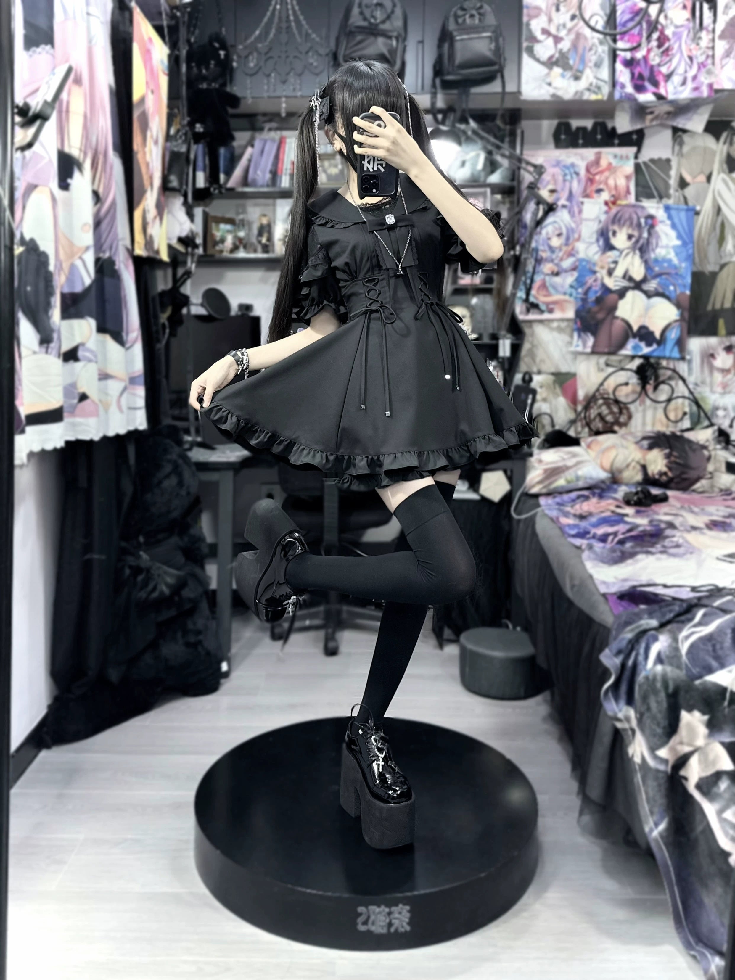 Black Jirai Kei dress with thigh highs platform shoes and lifted leg pose front mirror styling