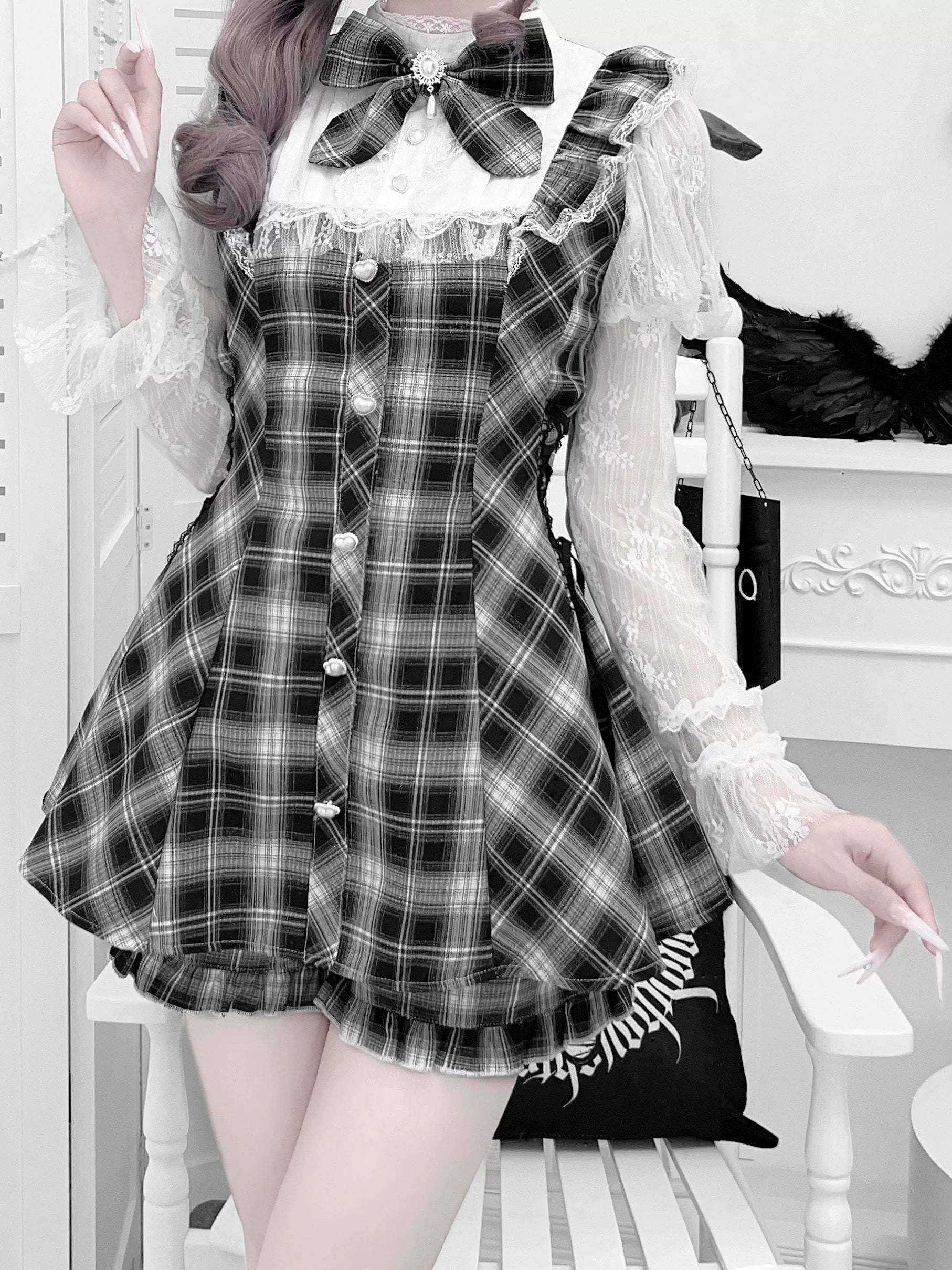 Close-up half body shot of Jirai Kei dress showing detailed ruffled collar design pearl button accents and lace Julie sleeve construction on female model