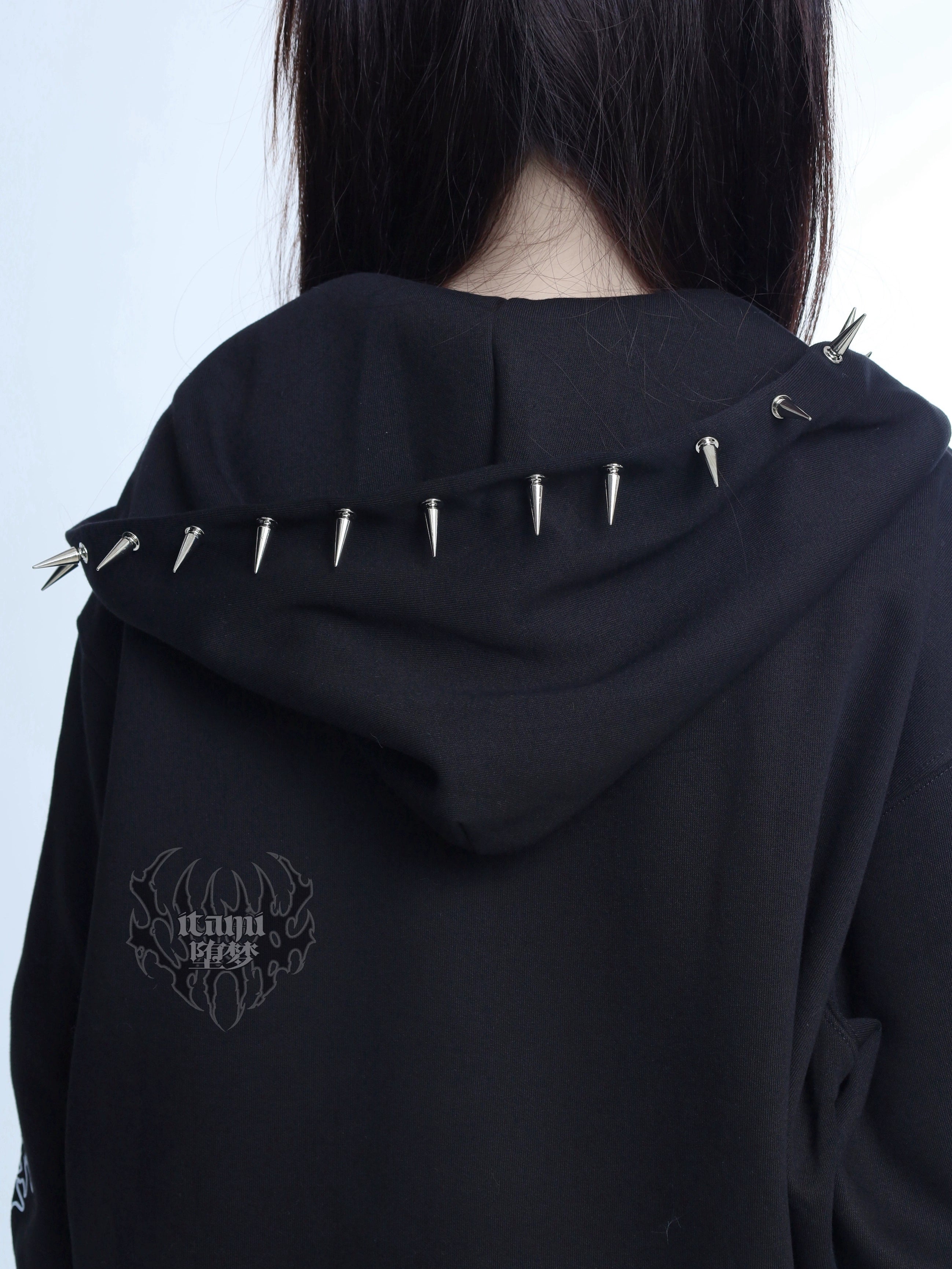 Jirai Kei punk hooded jacket rear close-up no model metal spike studs back of hood small brand logo lower back detail shot
