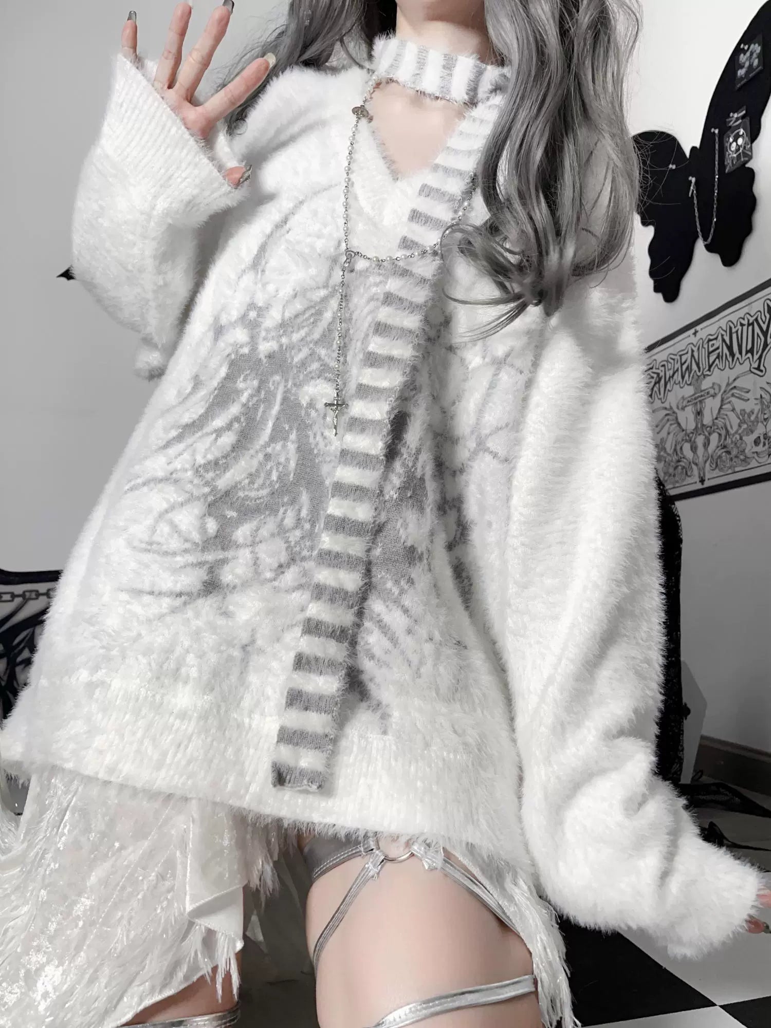 Jirai Kei sweater three-quarter front view with long loose sleeves frayed hem silver leg straps