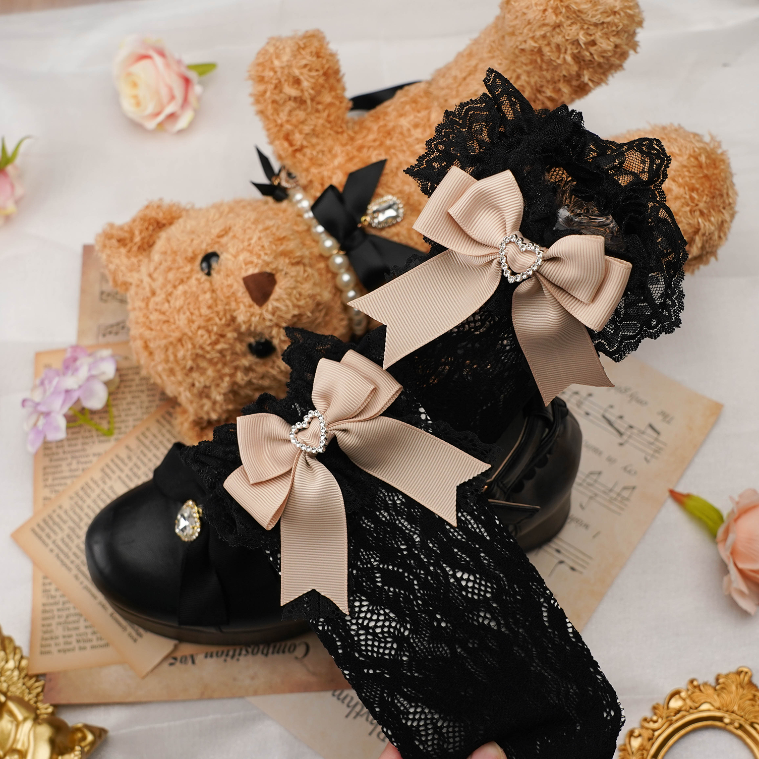 Jirai kei lace ankle socks with heart-shaped rhinestones and decorative satin bows in vibrant color options displayed on premium background