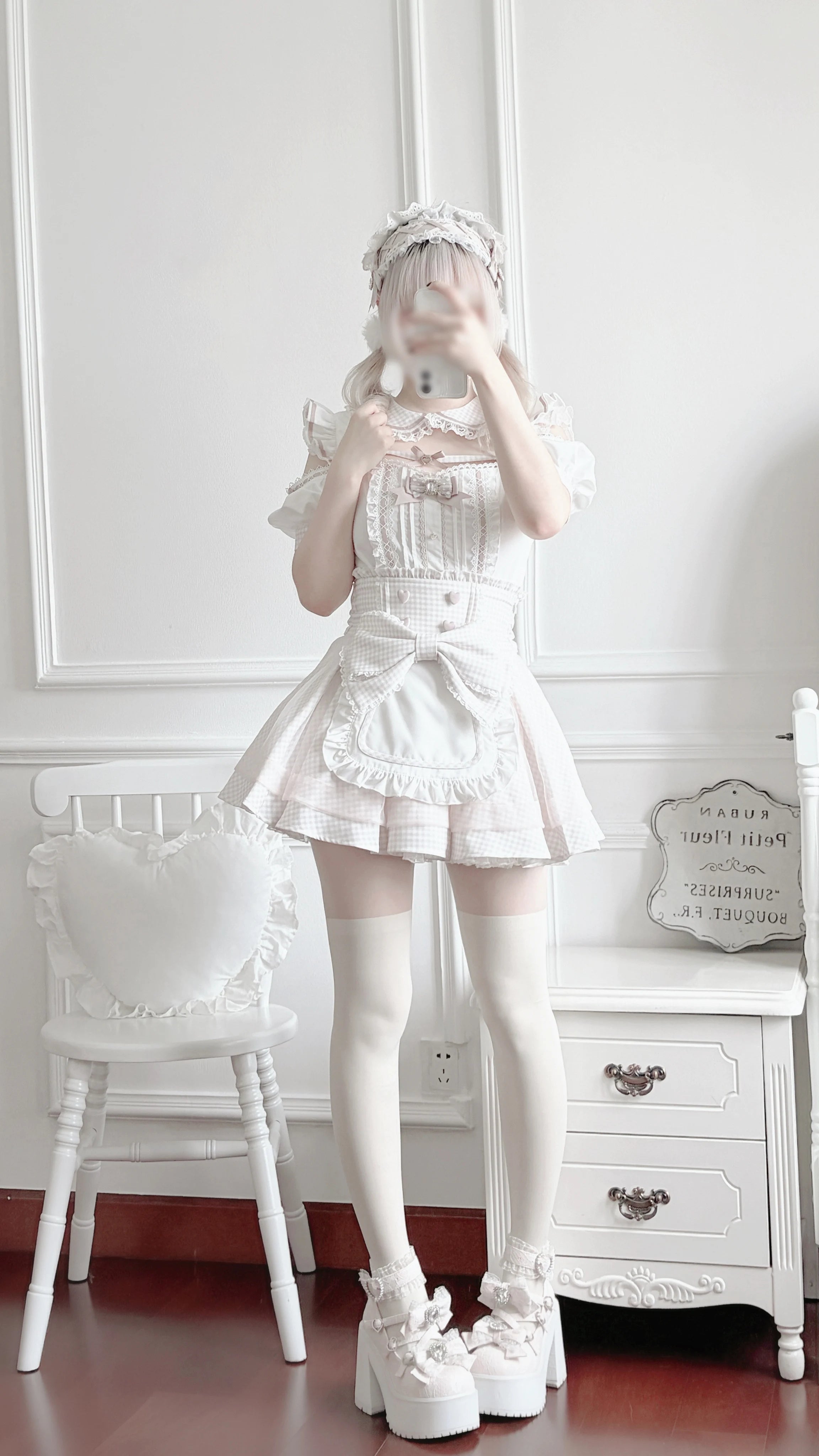 Full body selfie view of person wearing pink and white gingham Jirai Kei maid outfit set with platform Mary Jane shoes and styled hair indoors