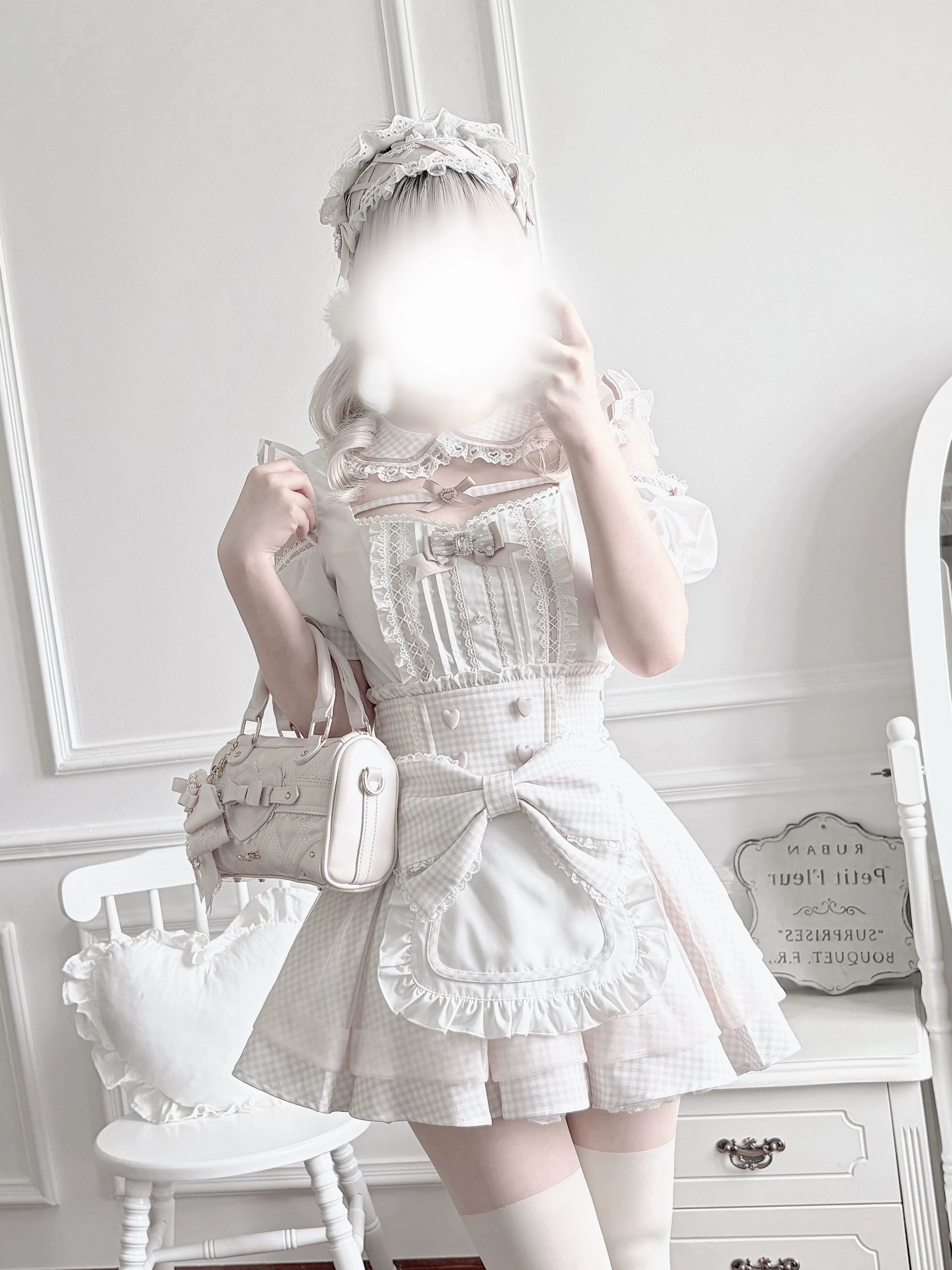 Detailed close-up view of gingham Jirai Kei maid blouse showing square neckline, Peter Pan collar construction, and open-shoulder design elements