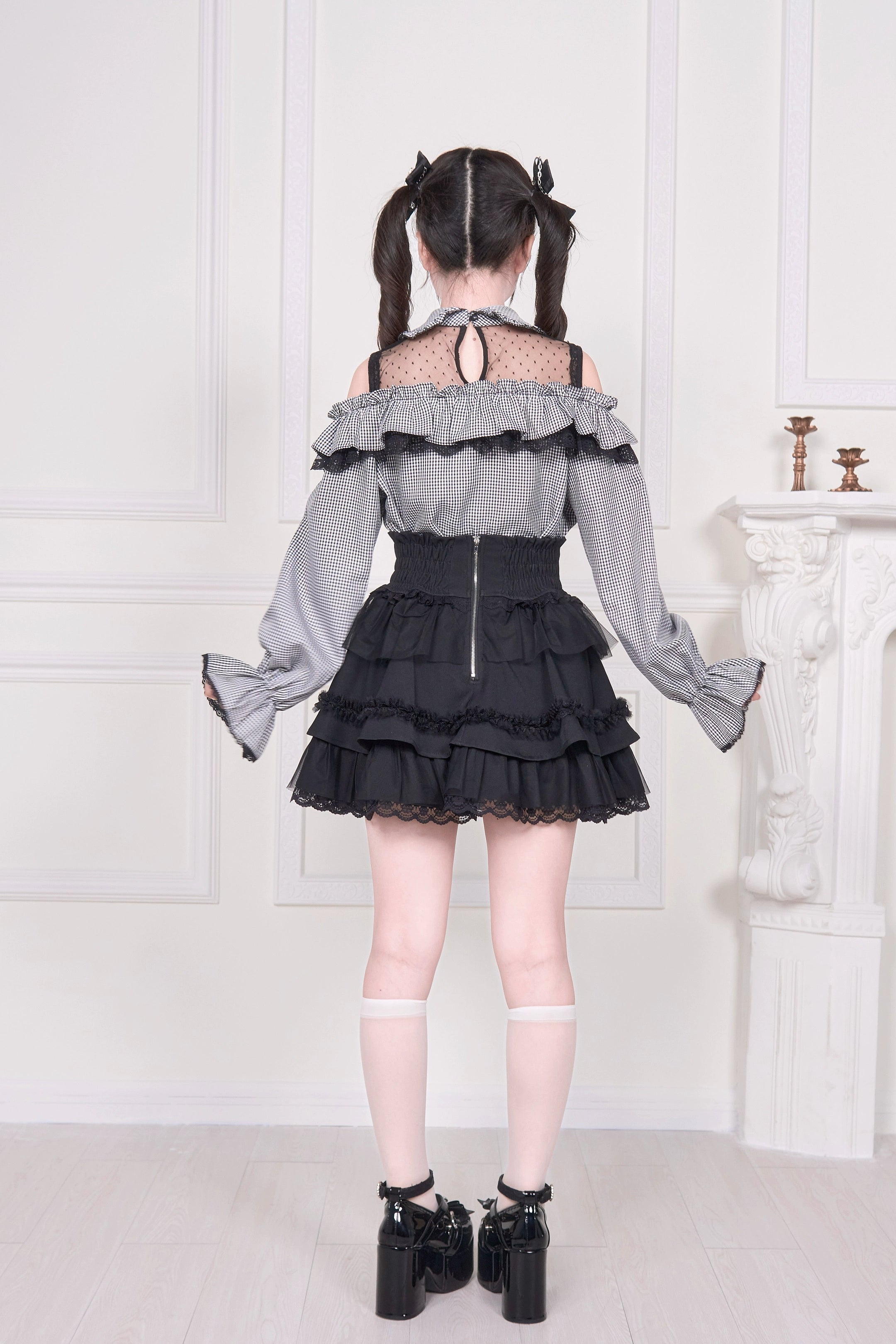 Cold-shoulder Jirai Kei blouse back view on model showing exposed back and zip-up design details