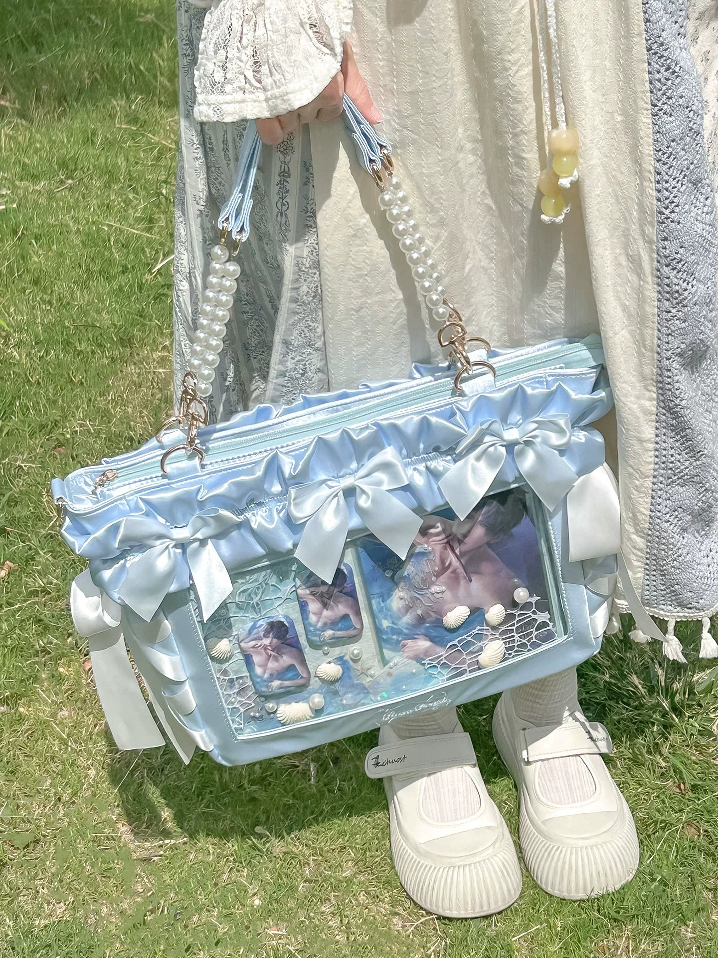 Jirai Kei laptop itabag red and black variant showing bold color blocking design with crimson ruffles and transparent window