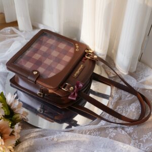 Brown plaid ita handbag flat lay top-down view on delicate lace fabric backdrop showcasing transparent checked panel and premium PU leather construction details