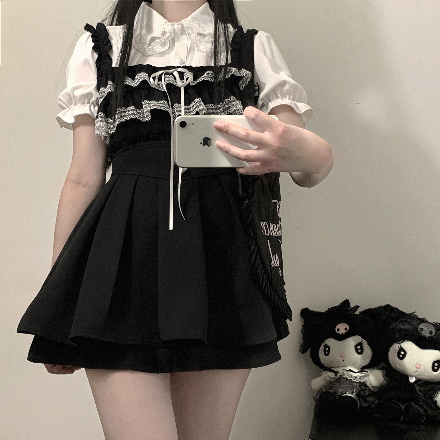 Black Jirai Kei blouse with puff short sleeves and lace bust trim, paired with pleated mini skirt, mirror selfie close-up front view with detailed collar focus