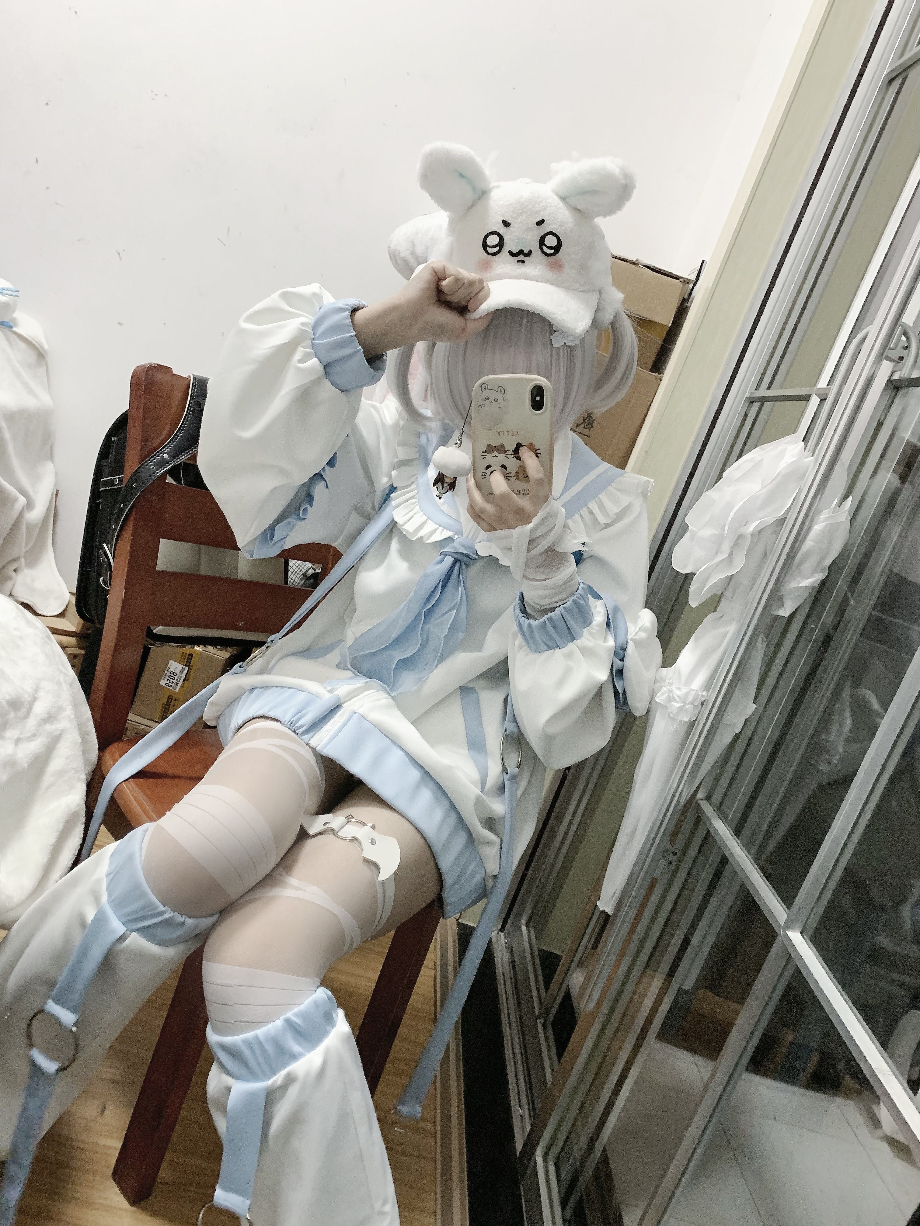 Tenshi Kaiwai sailor jacket bunny hat ensemble mirror selfie sitting side view detailed styling lace hosiery coordinates