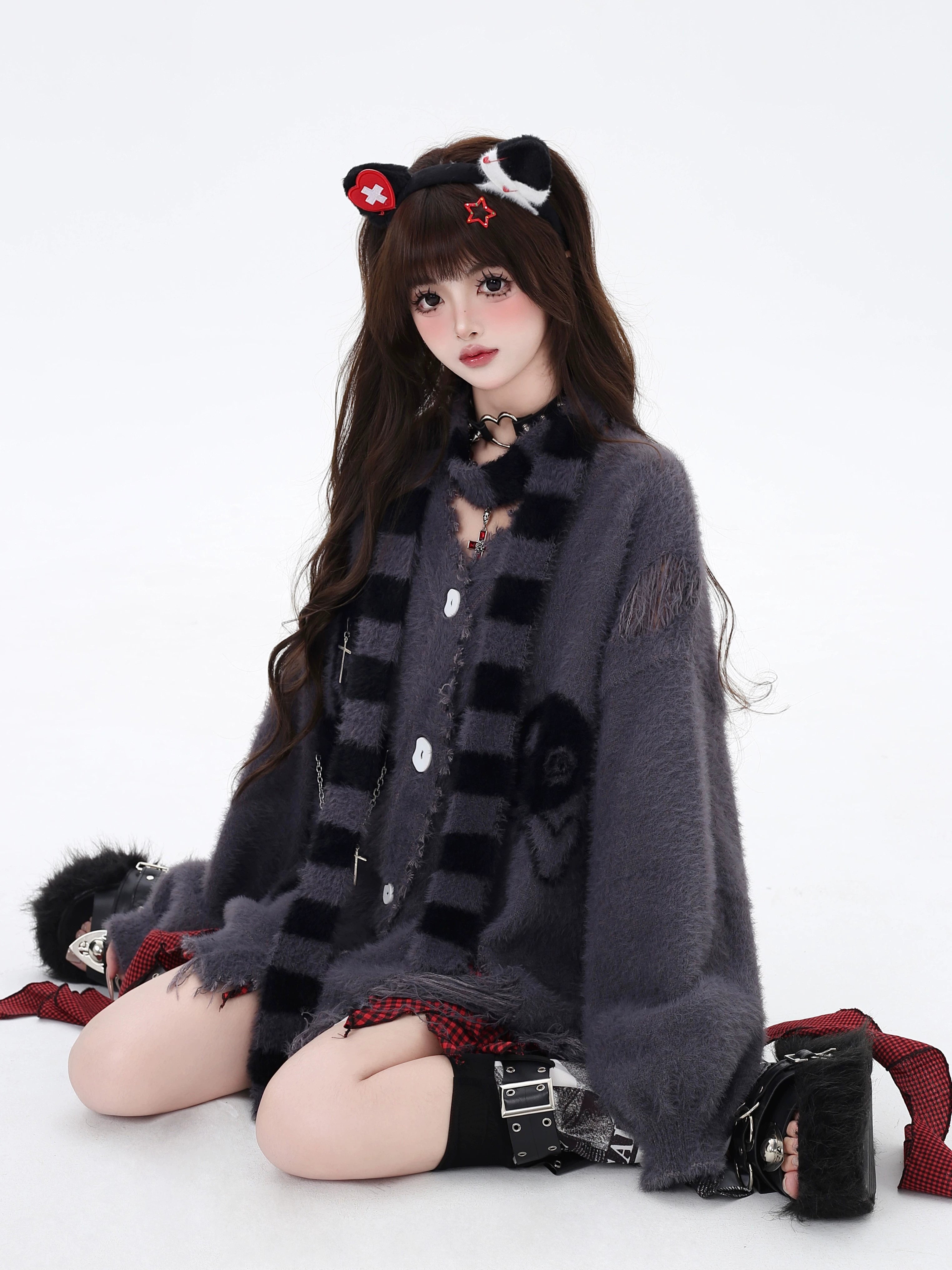 Purple Jirai Kei cardigan with striped scarf, oversized silhouette, distressed hem detail, and embroidered motifs showcasing alternative fashion aesthetic styling
