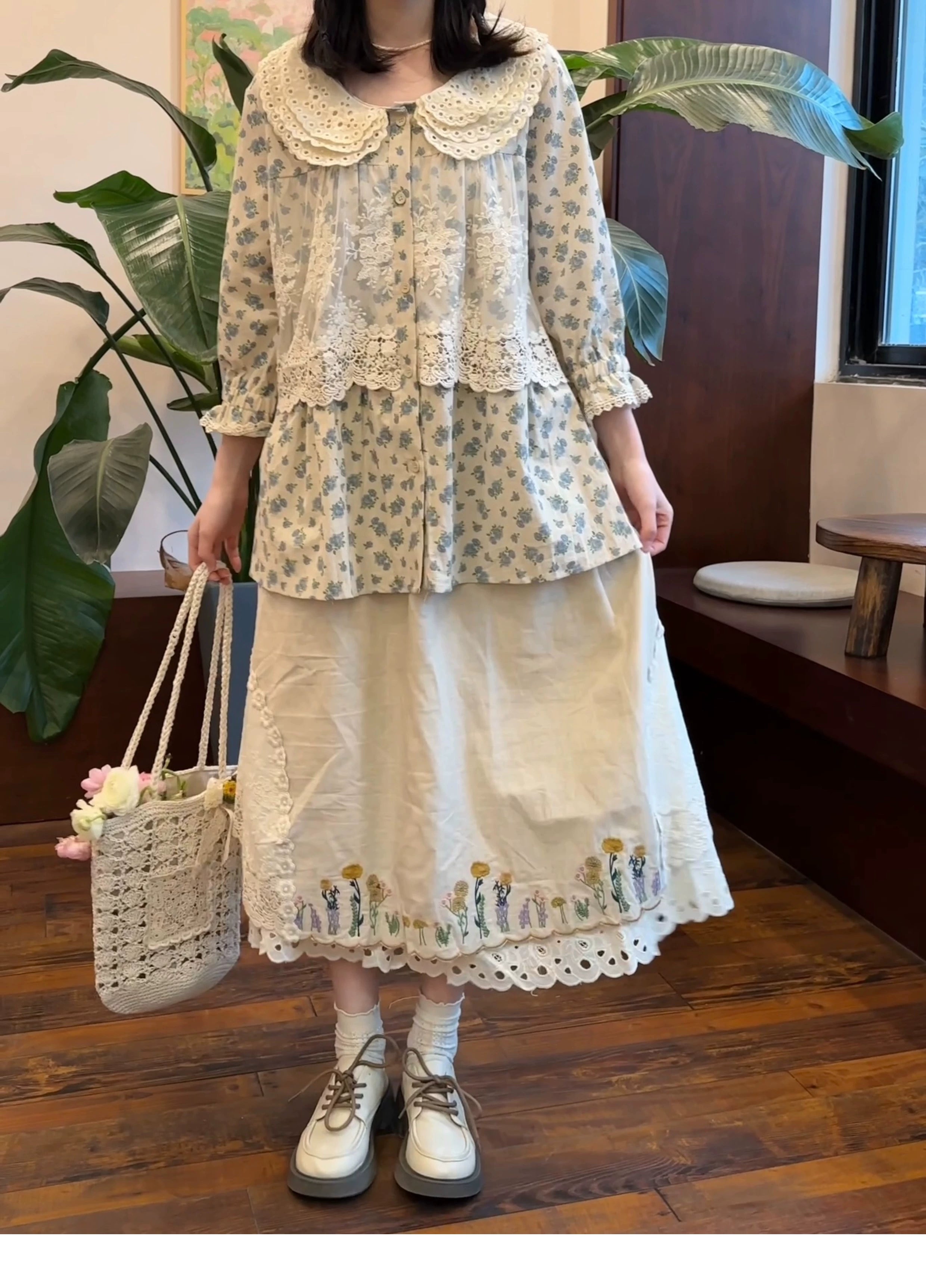 Mori style retro two-piece outfit with peter pan collar floral blouse and off-white midi skirt with embroidery lace trim full body view