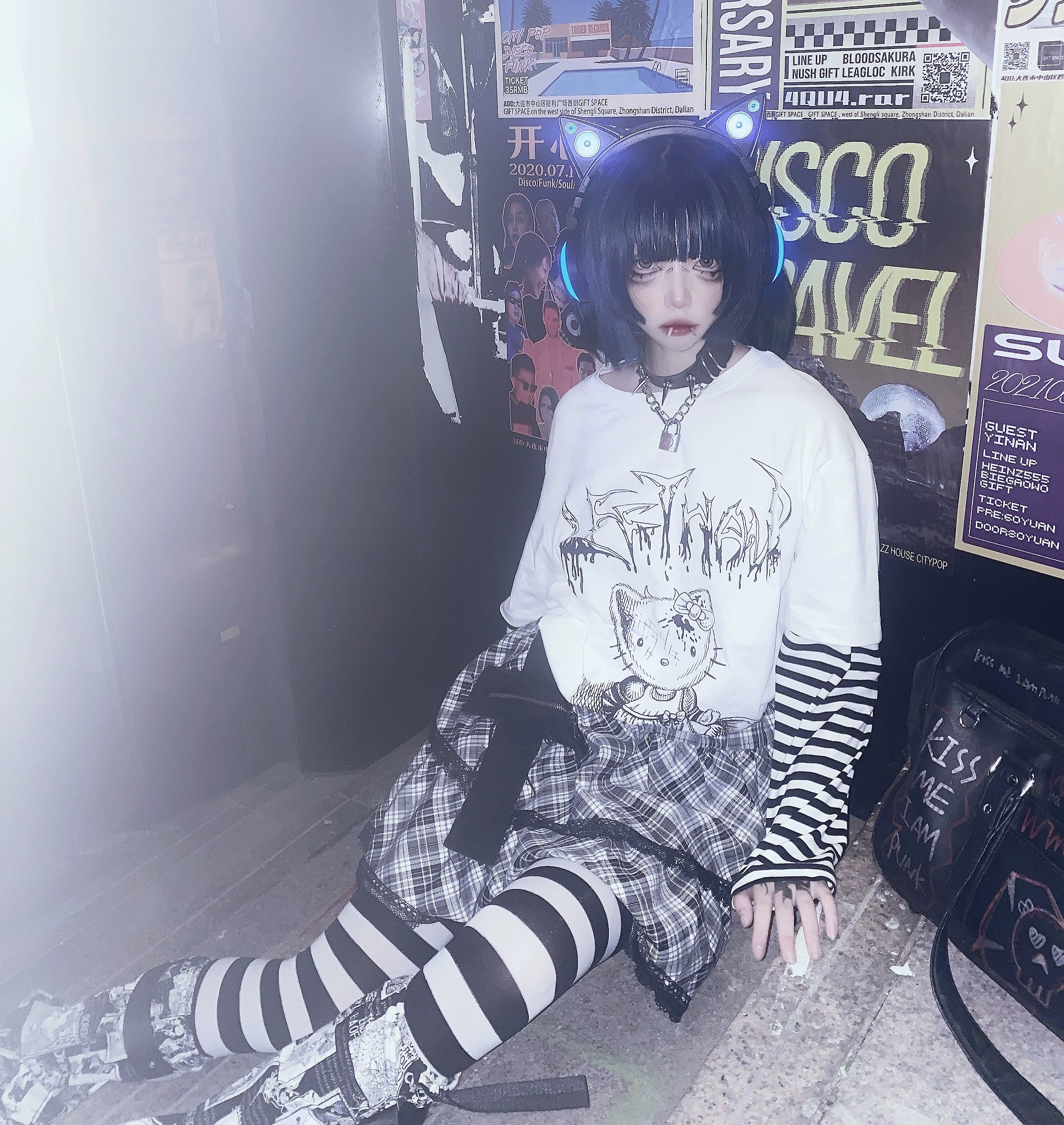 Jirai kei striped false two-piece long sleeve punk tee worn casually showing fit and silhouette on model full body