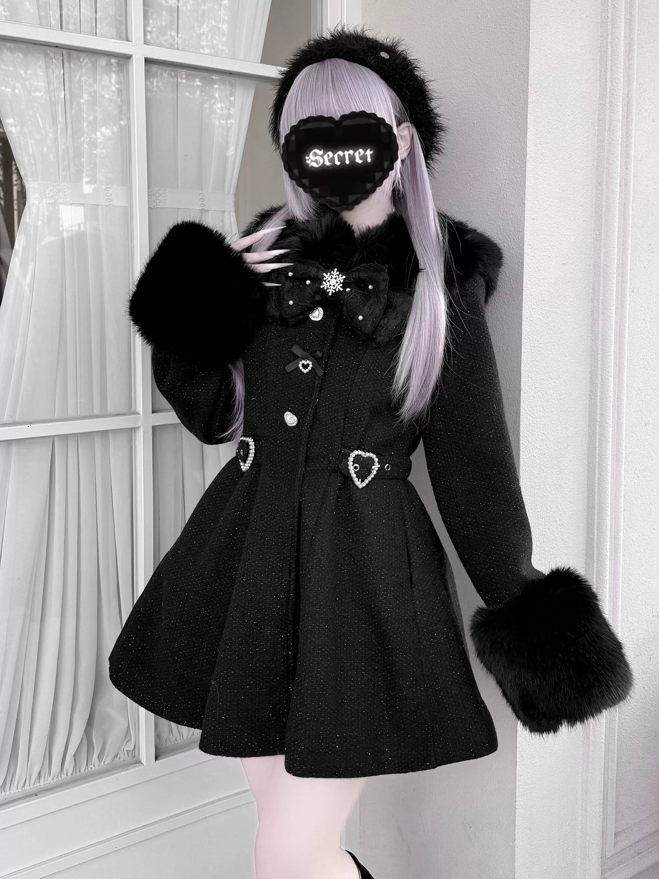 Black Ryousangata Jirai Kei winter coat with removable faux fur trim and bow brooch three-quarter angle modeled on light purple-haired figure