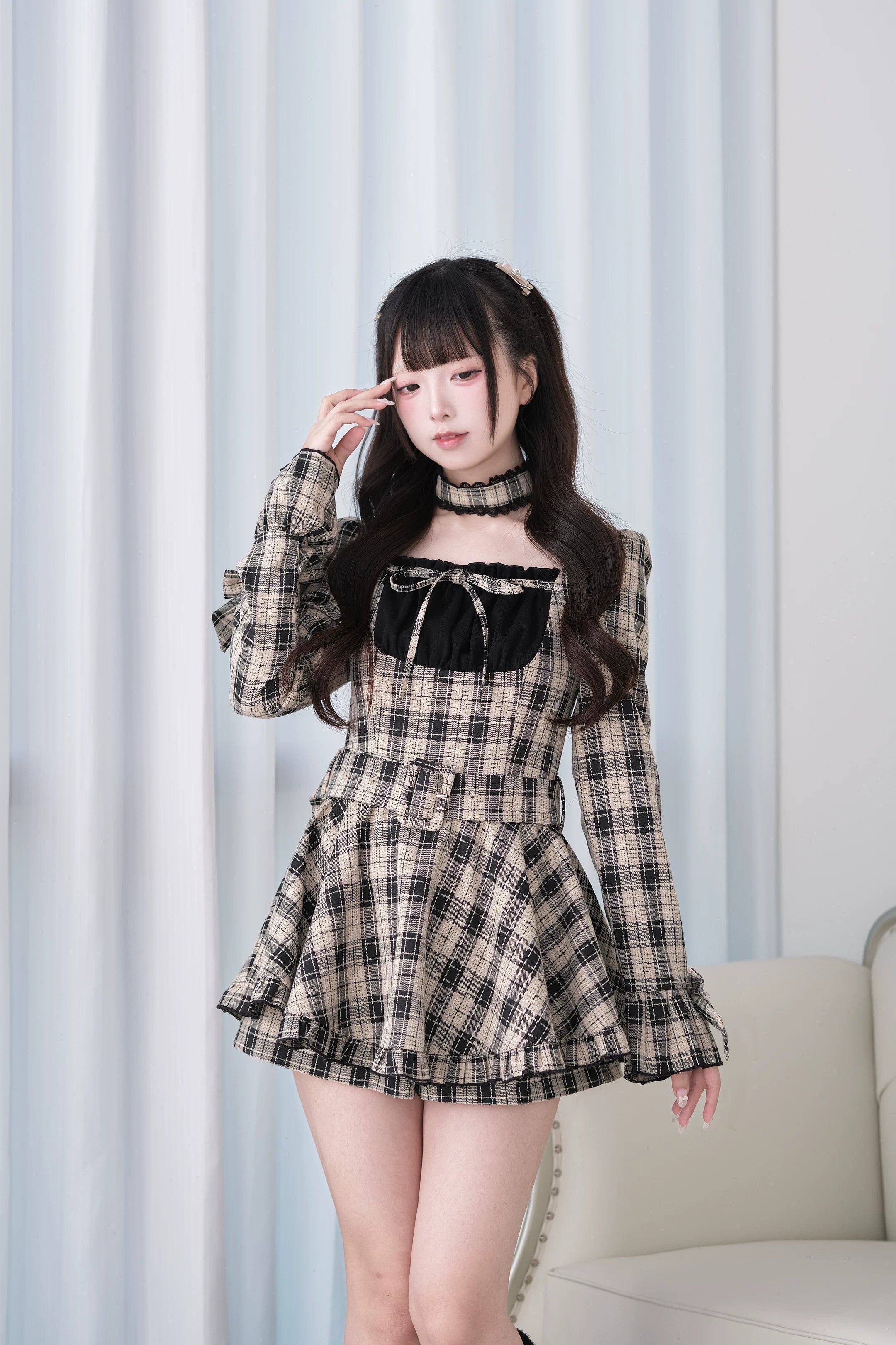 Brown tartan Jirai Kei mini dress set three-quarter front view with velvet bow detail and waist belt