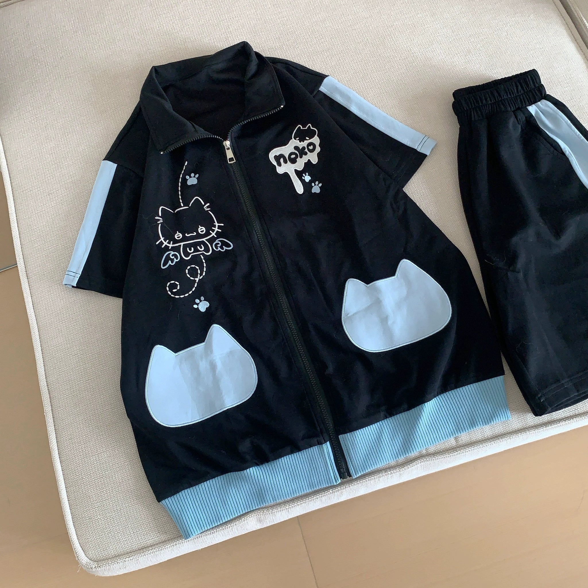 Angel kitten Jirai Kei two-piece set fabric texture and construction quality close-up showing cotton-polyester blend, ribbed details, and color-fast dye work