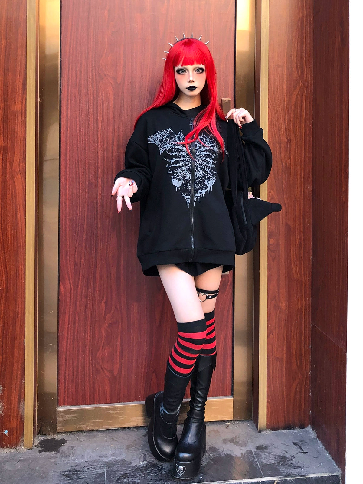 Ultra-thin Jirai Kei hoodie laid flat, lightweight construction visible, bone wing print detail, perfect for layering in Jirai Kei goth punk styling