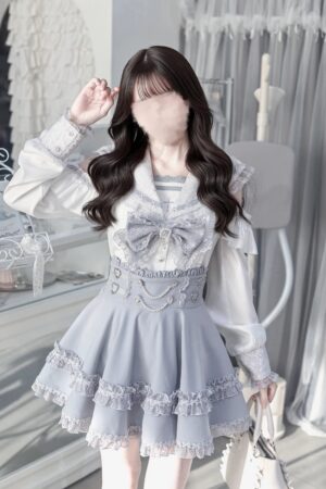 Ryousangata sailor collar jirai kei blouse and high-waist skirt set front three-quarter view showing light grey and white color scheme with lace sailor collar trim and ruffled skirt hem