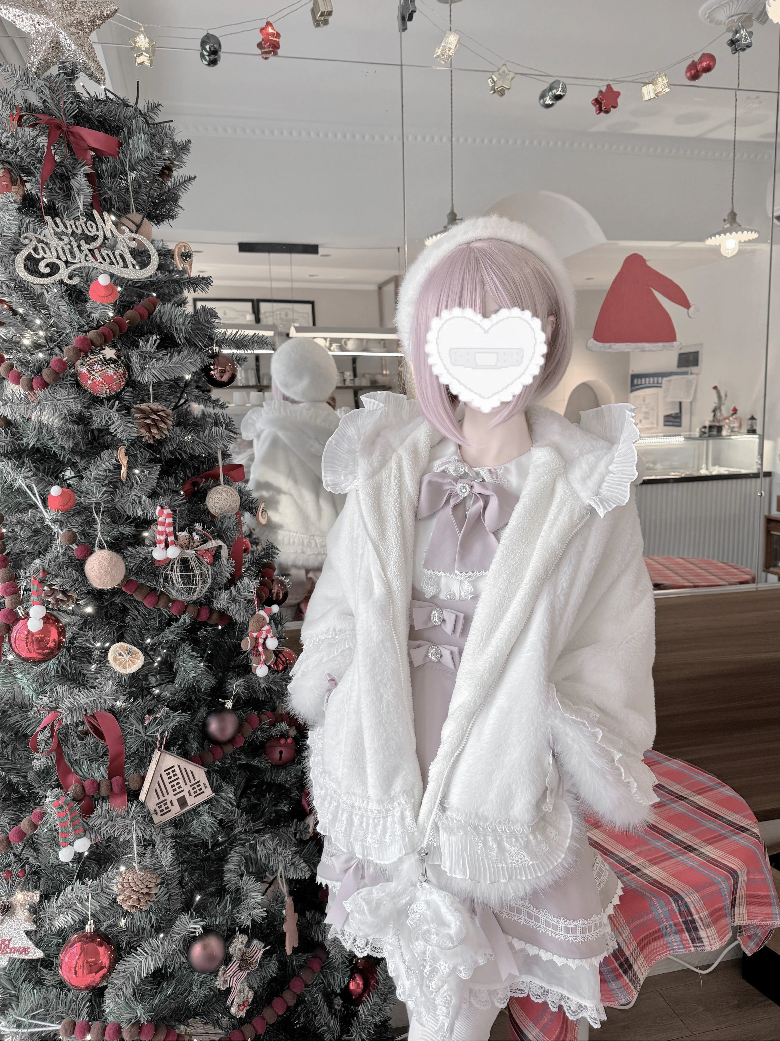 Front-facing mannequin or standing view of white cat ear jirai kei fleece cape coat displaying structured hood and cape construction