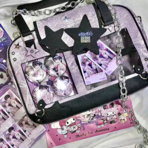 Purple star-themed Jirai Kei itabag flat lay overhead with anime merchandise display and metal chain strap