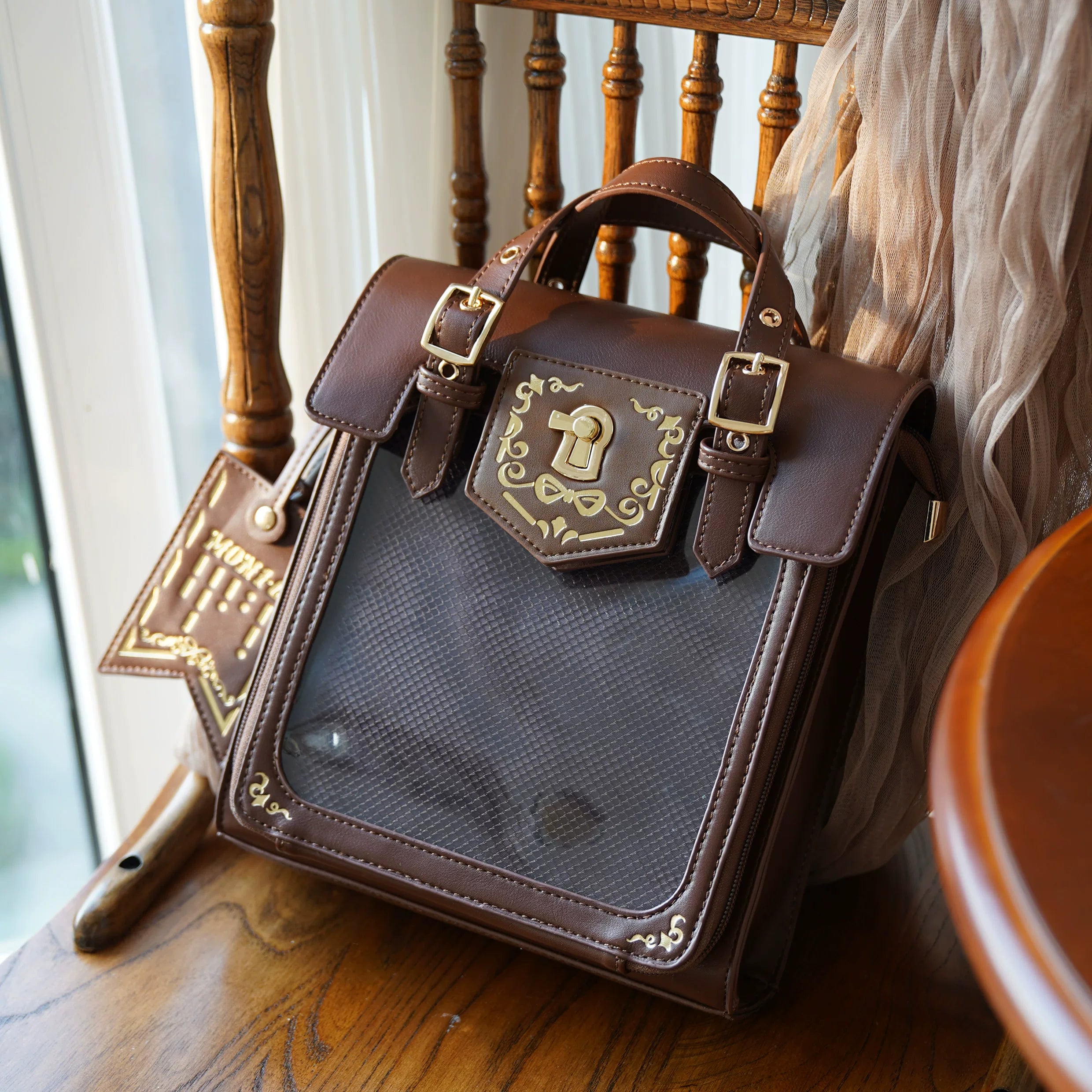 Brown vintage embroidered Jirai Kei ita bag with warm earthy aesthetic and clear display window, timeless color option for everyday alternative fashion wear