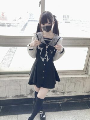 Black Jirai Kei sailor collar dress set full-body front view showing lace sleeves, ruffled skirt, front buttons, detachable bow, and coordinated shorts with black knee socks