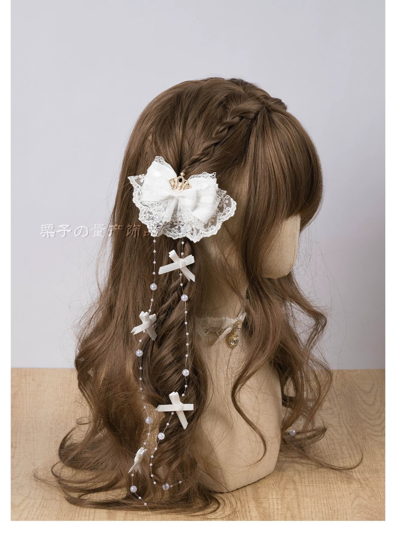 Jirai Kei pearl crown hair clip detail shot showcasing intricate rhinestone crown, artificial pearl strands, and delicate lace bow