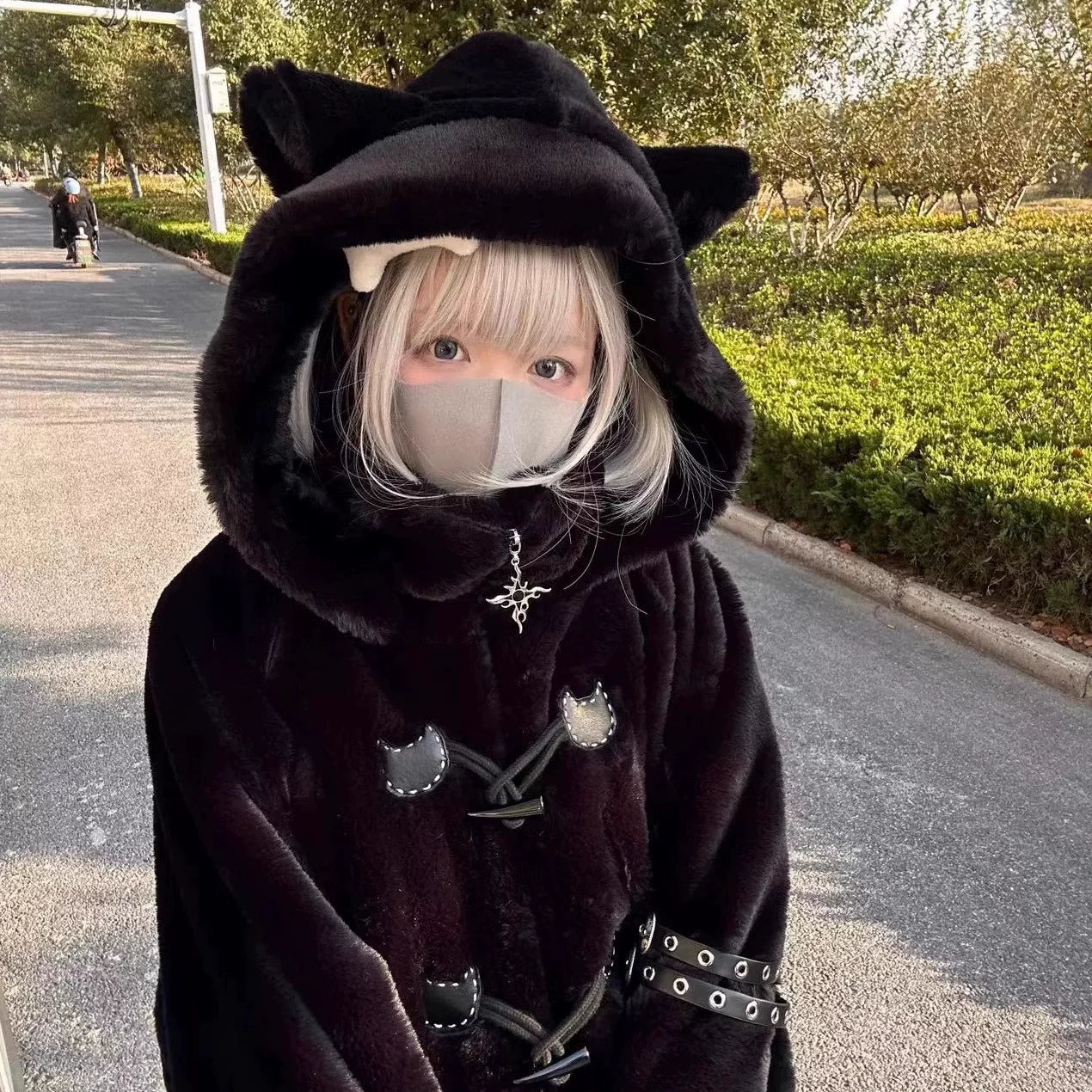 White fuzzy cat ear hooded jirai kei coat full length side profile outfit styling photography