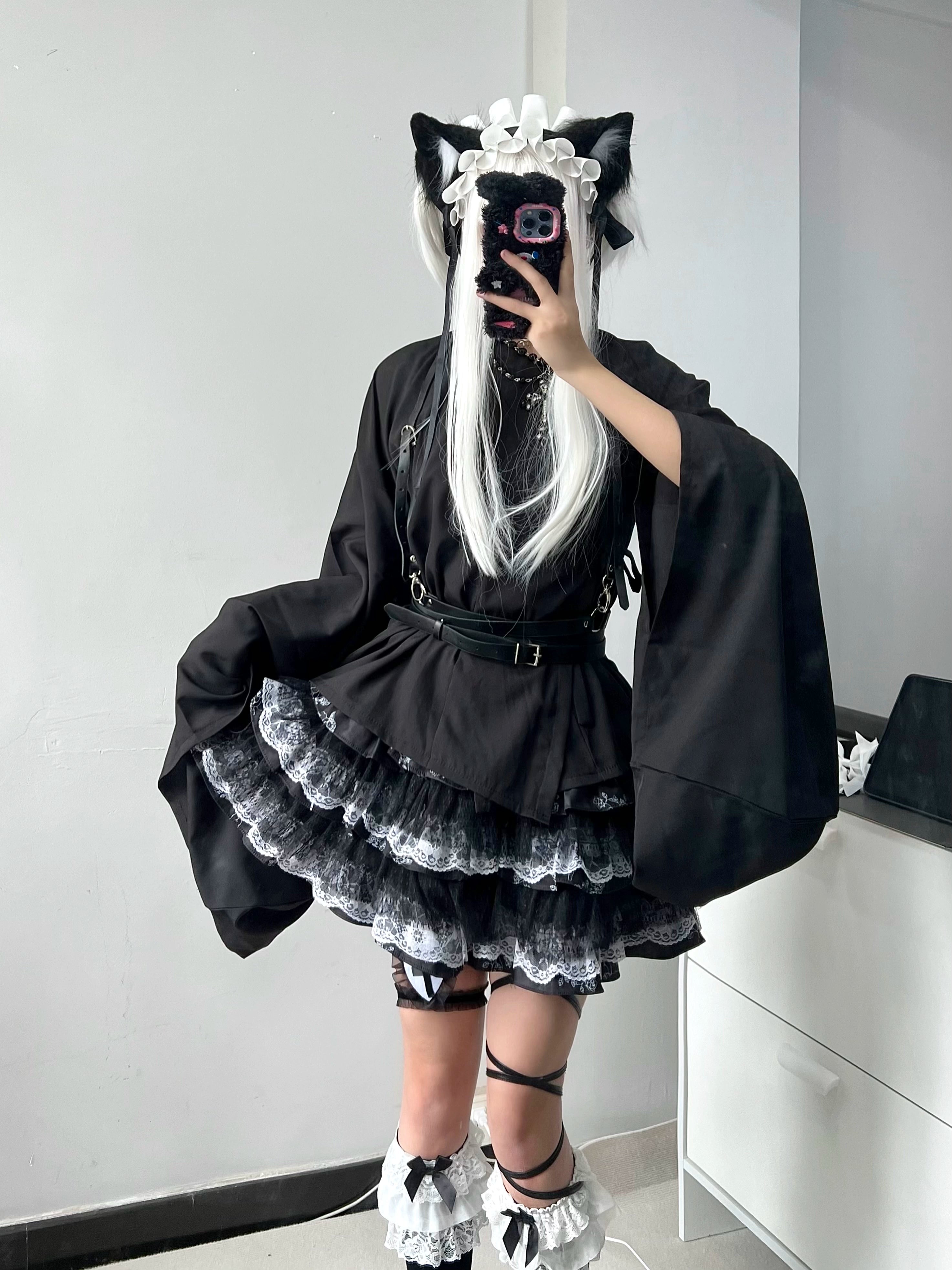 Layered lace puff skirt movement photography showing silhouette and dramatic ruffle cascade Jirai Kei fashion piece