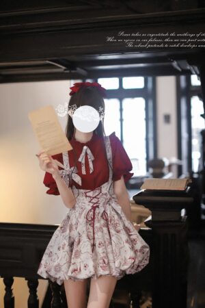 Classic Lolita jacquard salopette with lace-up front detail burgundy blouse red hair accessory vintage indoor styling