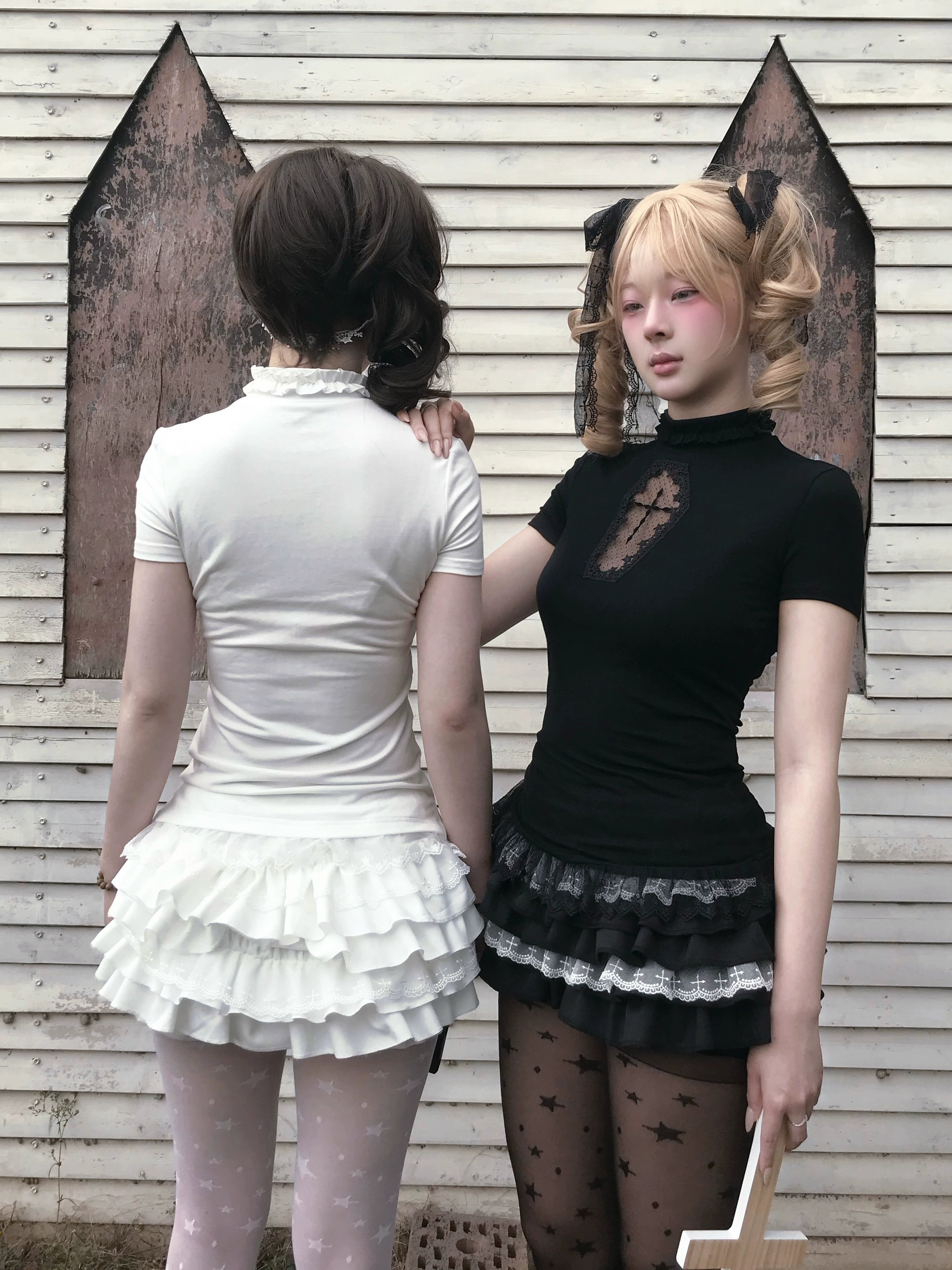 Back view of gothic doll bloomers showing tiered ruffle layers and cross motif pattern design