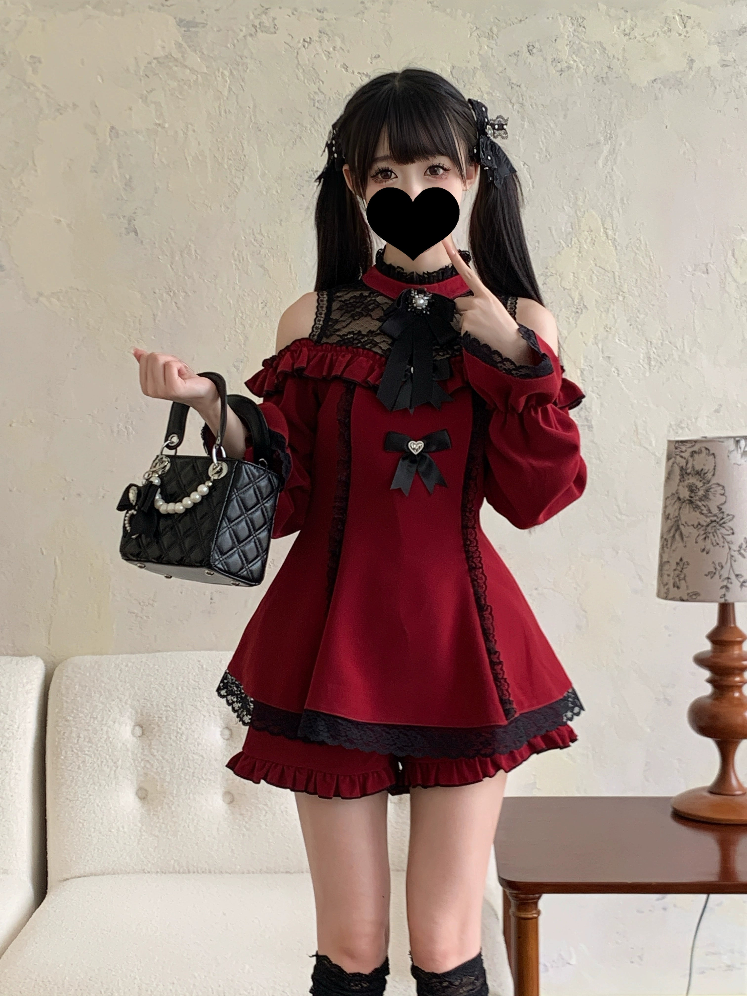 Wine red off-shoulder lace dress shorts set with ruffled hem quilted handbag vintage styling indoor scene