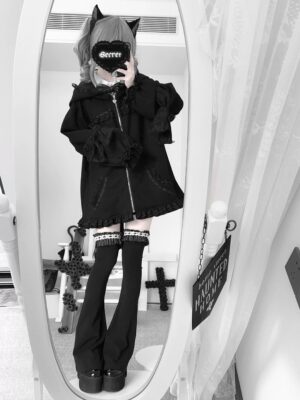 Black cat-ear hooded Jirai Kei jacket full-body front view with ruffled cuffs and oversized loose fit on masked female model in bedroom mirror