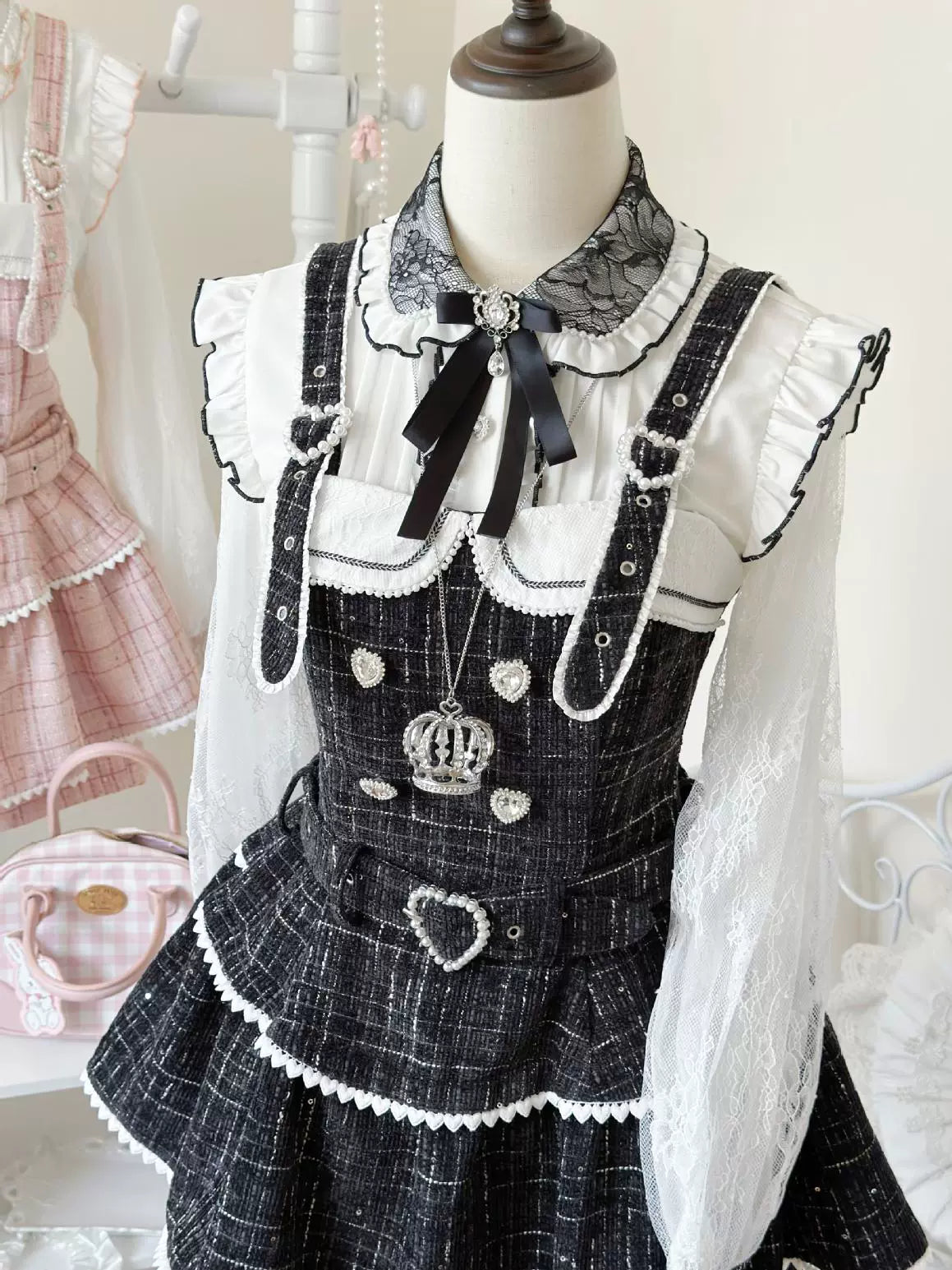 Black and pink Jirai Kei suspender skirt comparison, color options styling variations with heart buckle details