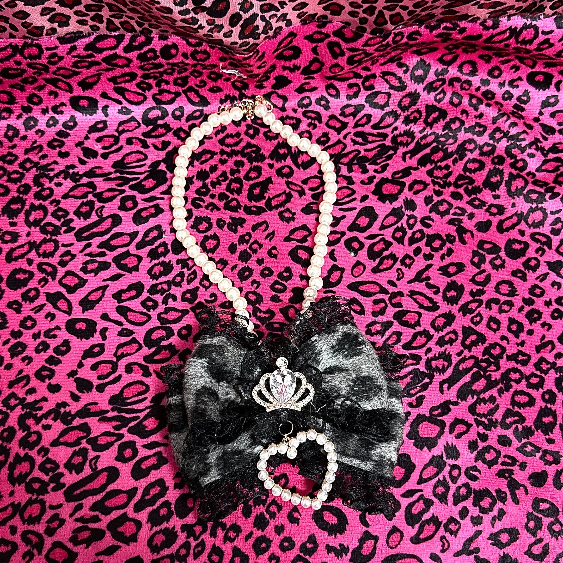 Grey-black leopard pearl choker with crown rhinestone pearl heart pendant and black lace trim flat lay style
