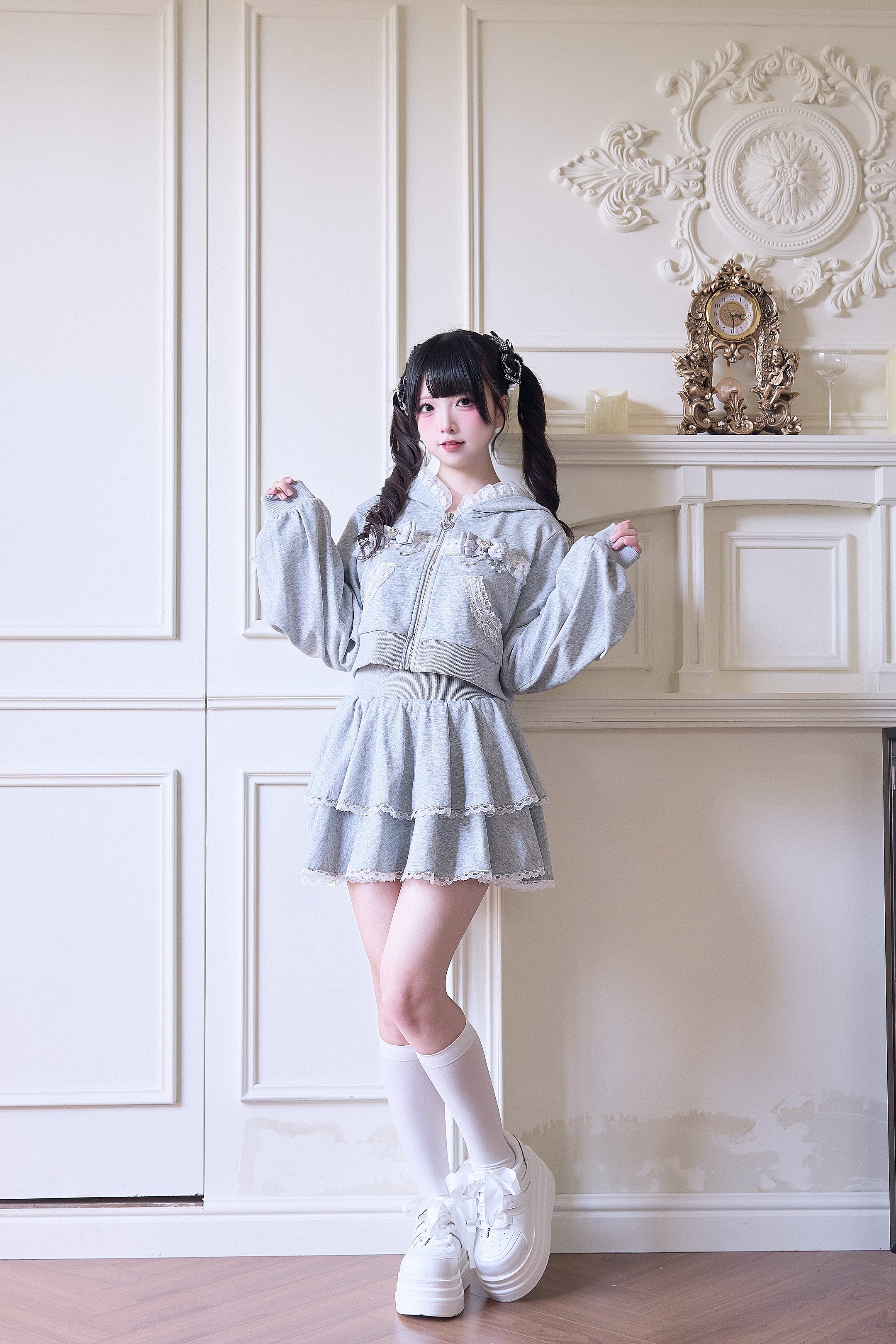 Gray Jirai Kei sport hoodie and double-layered mini skirt full-body shot with platform sneakers and white socks styling