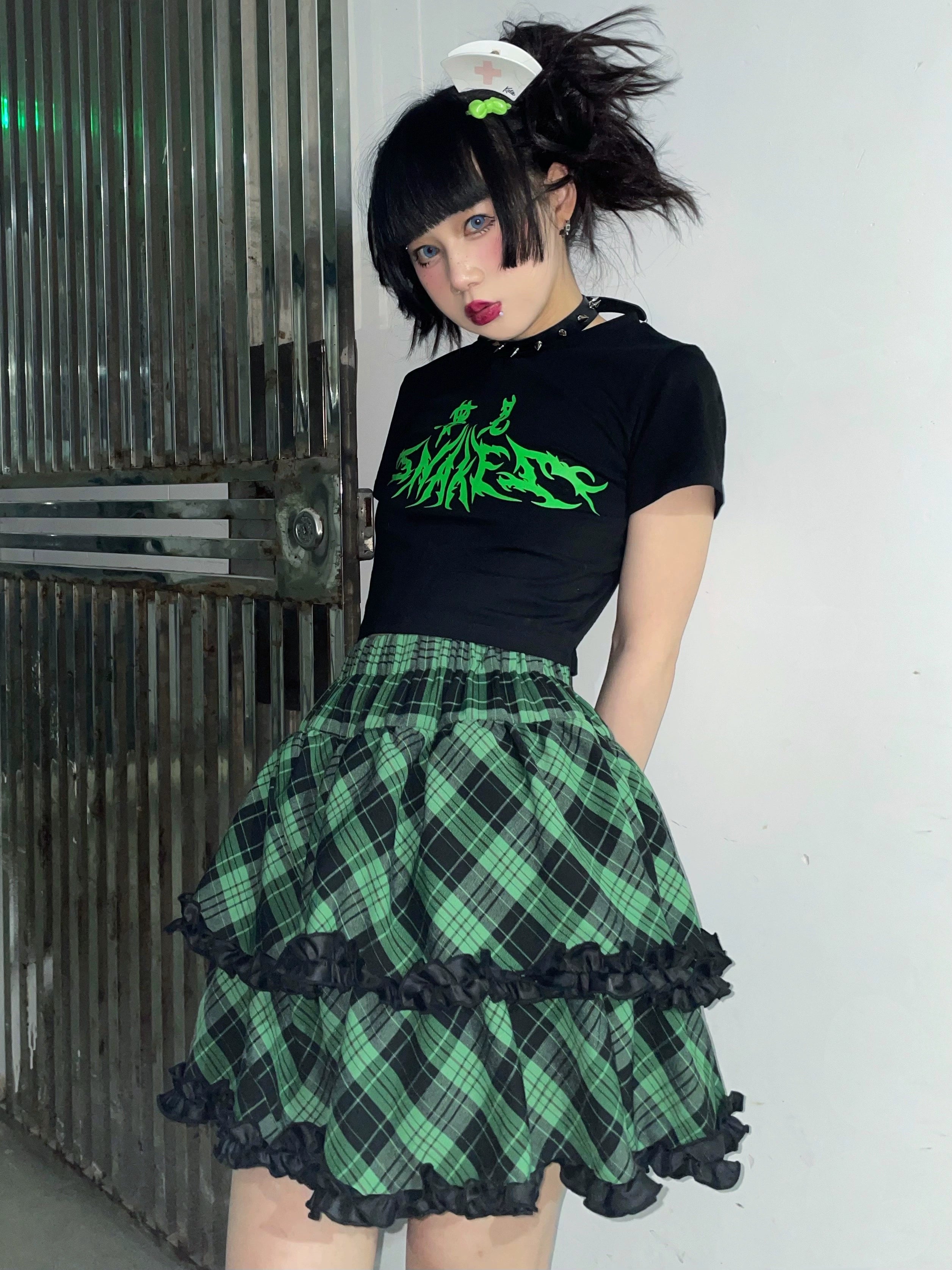 Pink-black plaid Jirai Kei ruffle skirt bow attachment point detail, customizable accessory option showcase