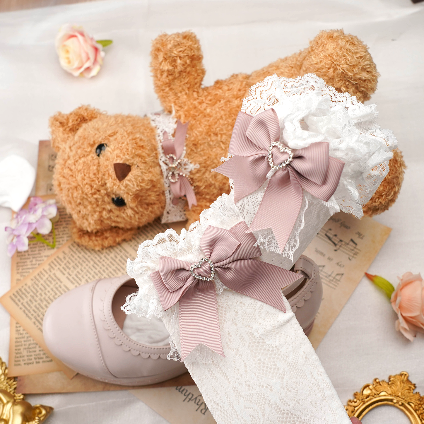 Premium jirai kei lace socks featuring heart rhinestone embellishments decorative satin bows and delicate lace fabric construction